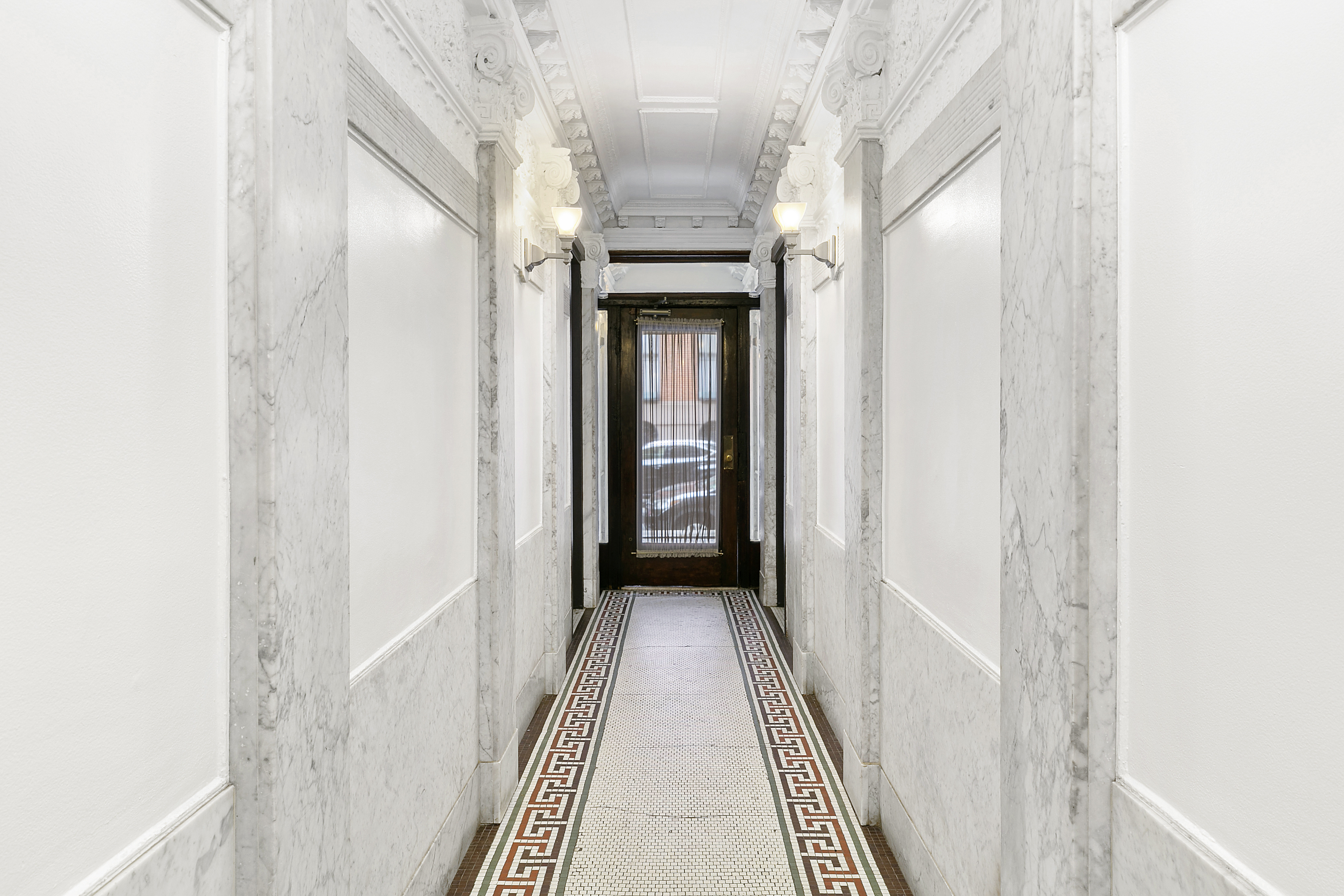 210 East 17th Street, Unit 5C Manhattan, NY 10003 - Photo 9 of 18 a view of a hallway with wooden floor and a hallway