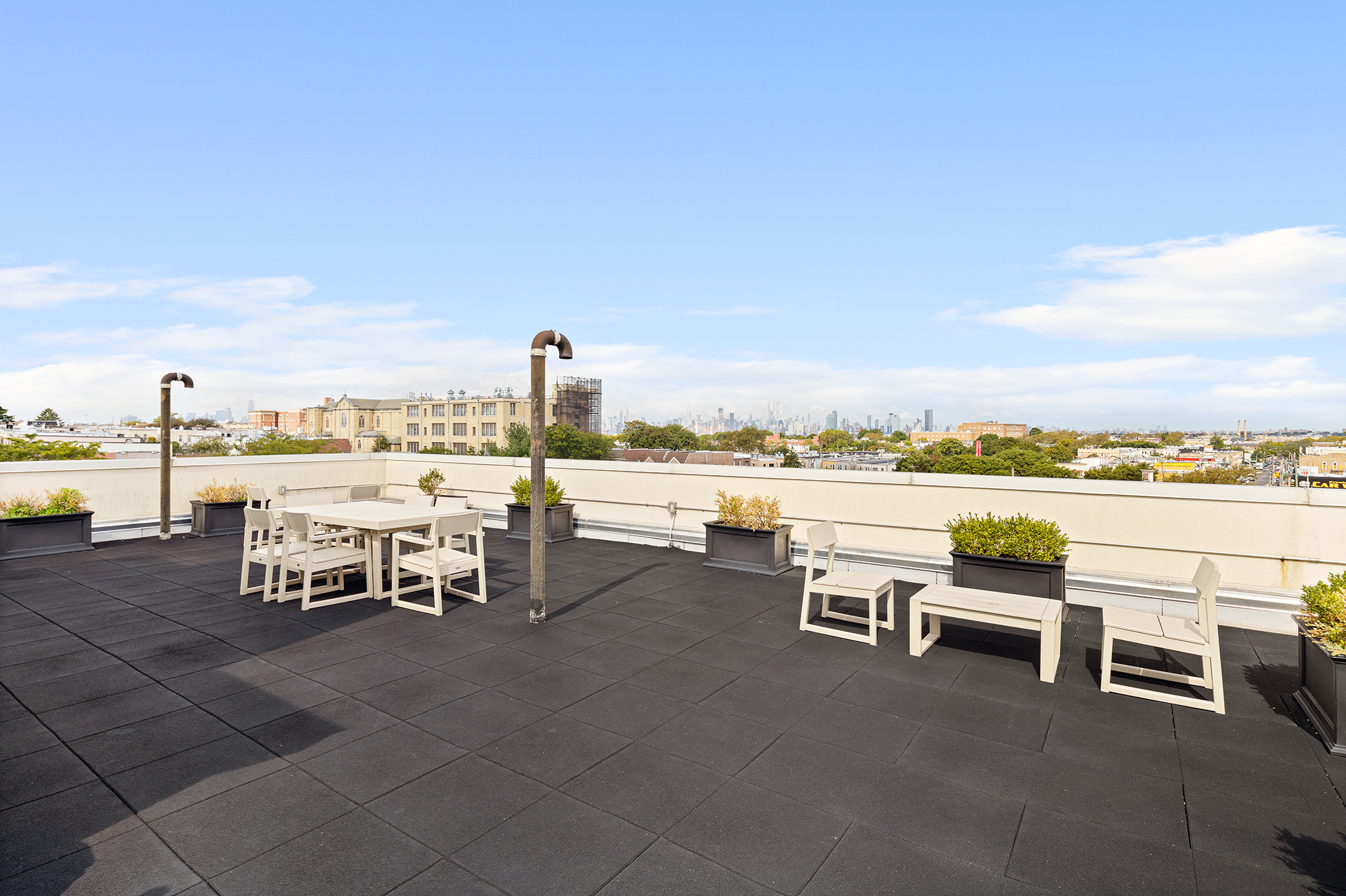 63-34 Fresh Pond Road, Unit 3D Queens, NY 11385 - Photo 9 of 14 a view of a terrace with furniture