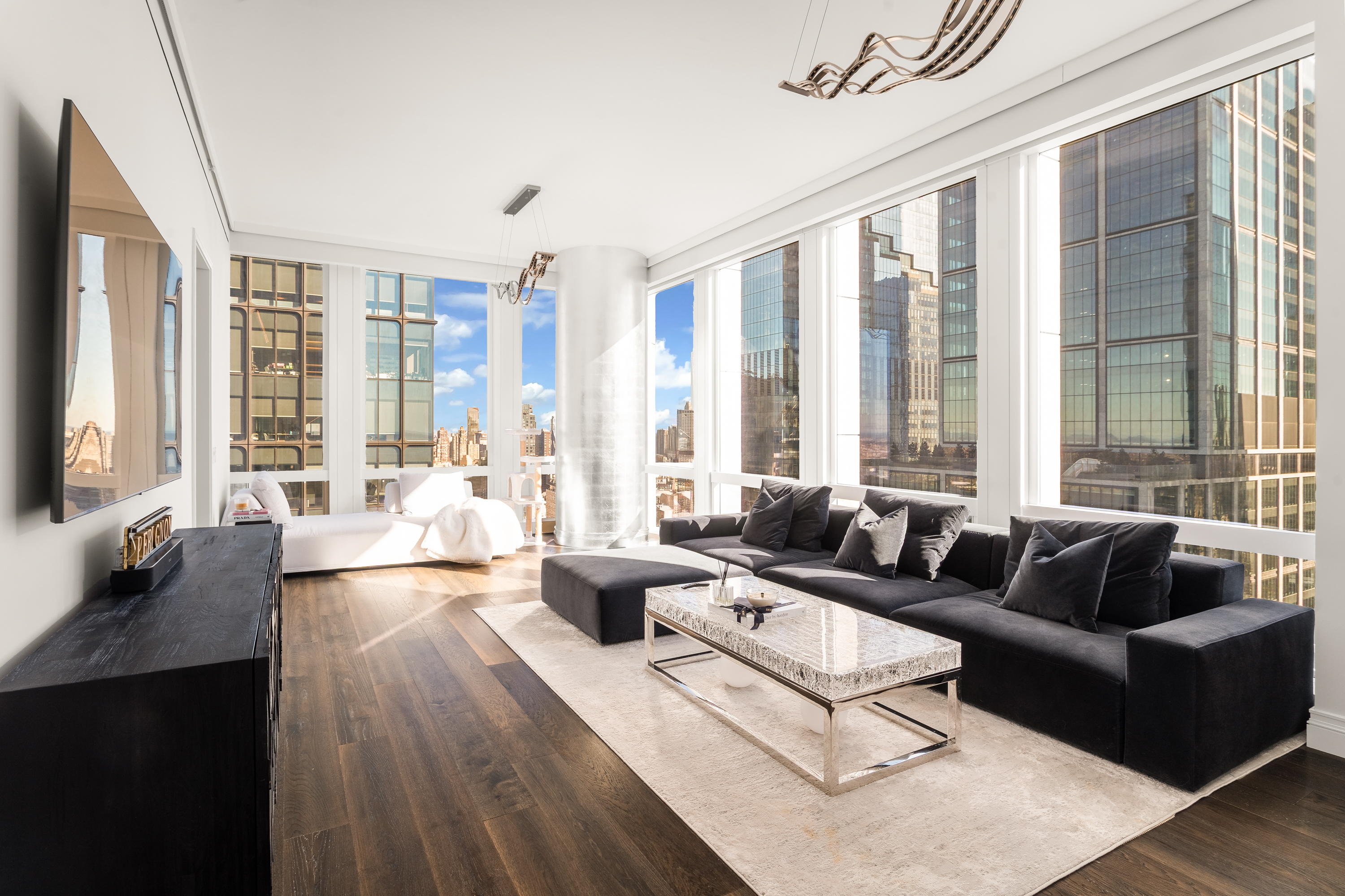35 Hudson Yards, Unit 5903 Manhattan, NY 10001 - Photo 2 of 15 a living room with furniture and large windows