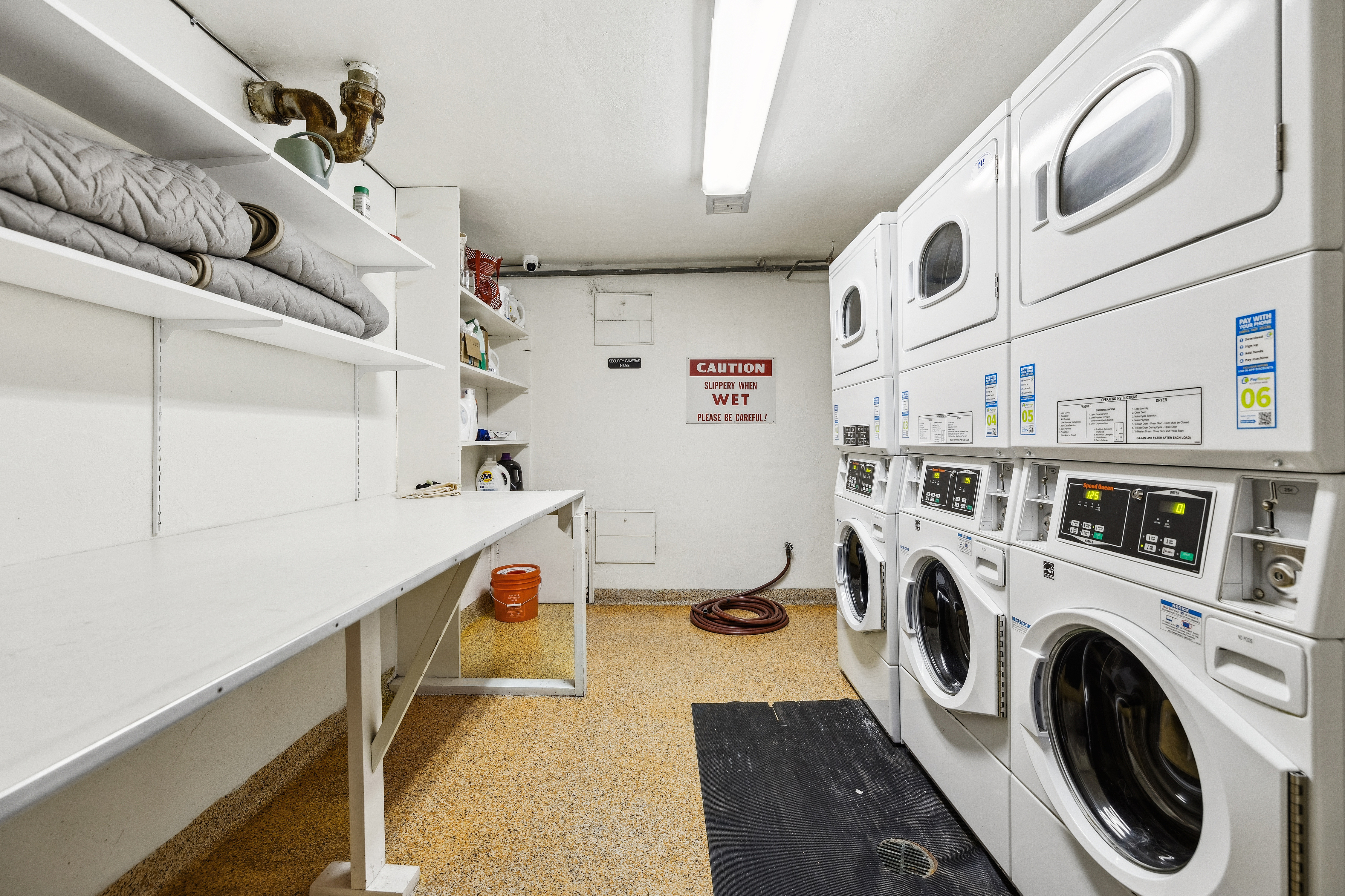 1998 Pacific Avenue San Francisco, CA 94109 - Photo 26 of 28 a storage room with washer and dryer