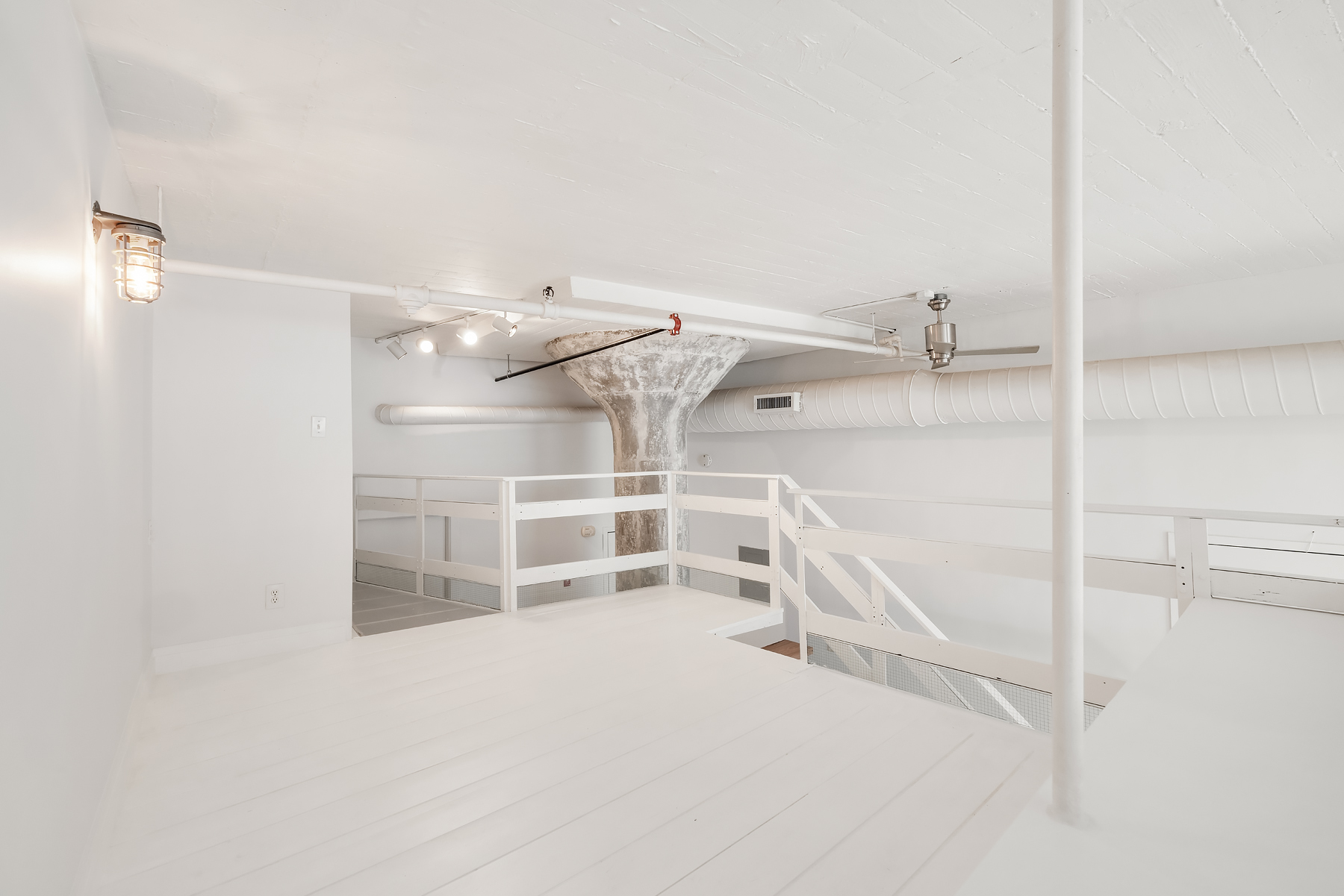 689 Myrtle Avenue, Unit 4E Brooklyn, NY 11205 - Photo 12 of 21 a view of a room with racks on the wall