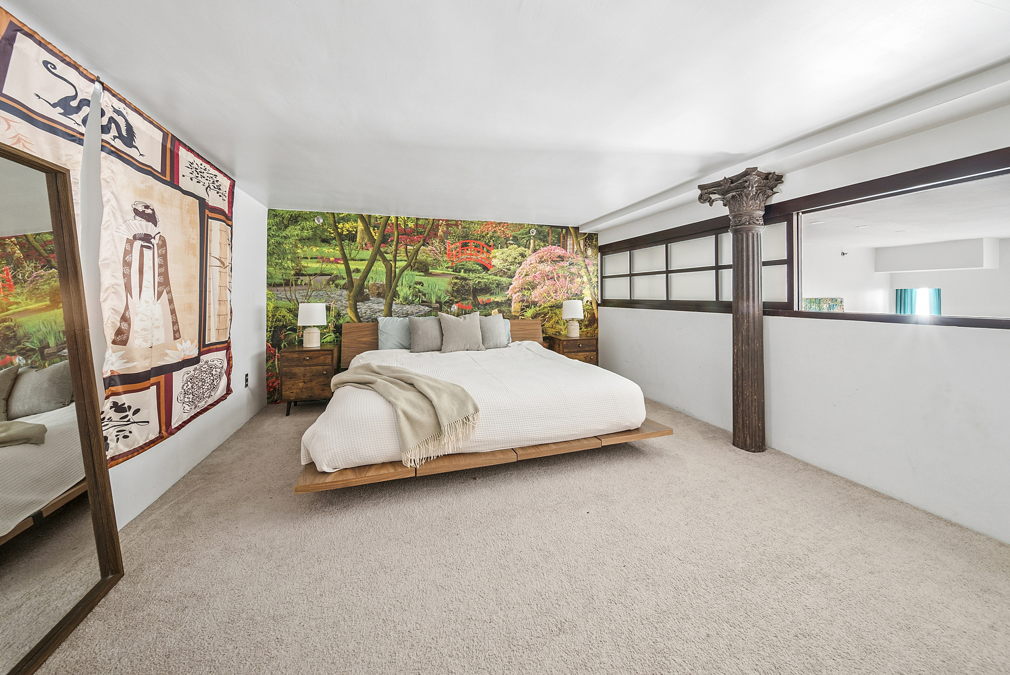 121 West 20th Street, Unit 3C Manhattan, NY 10011 - Photo 7 of 10 a bedroom with furniture and a large window