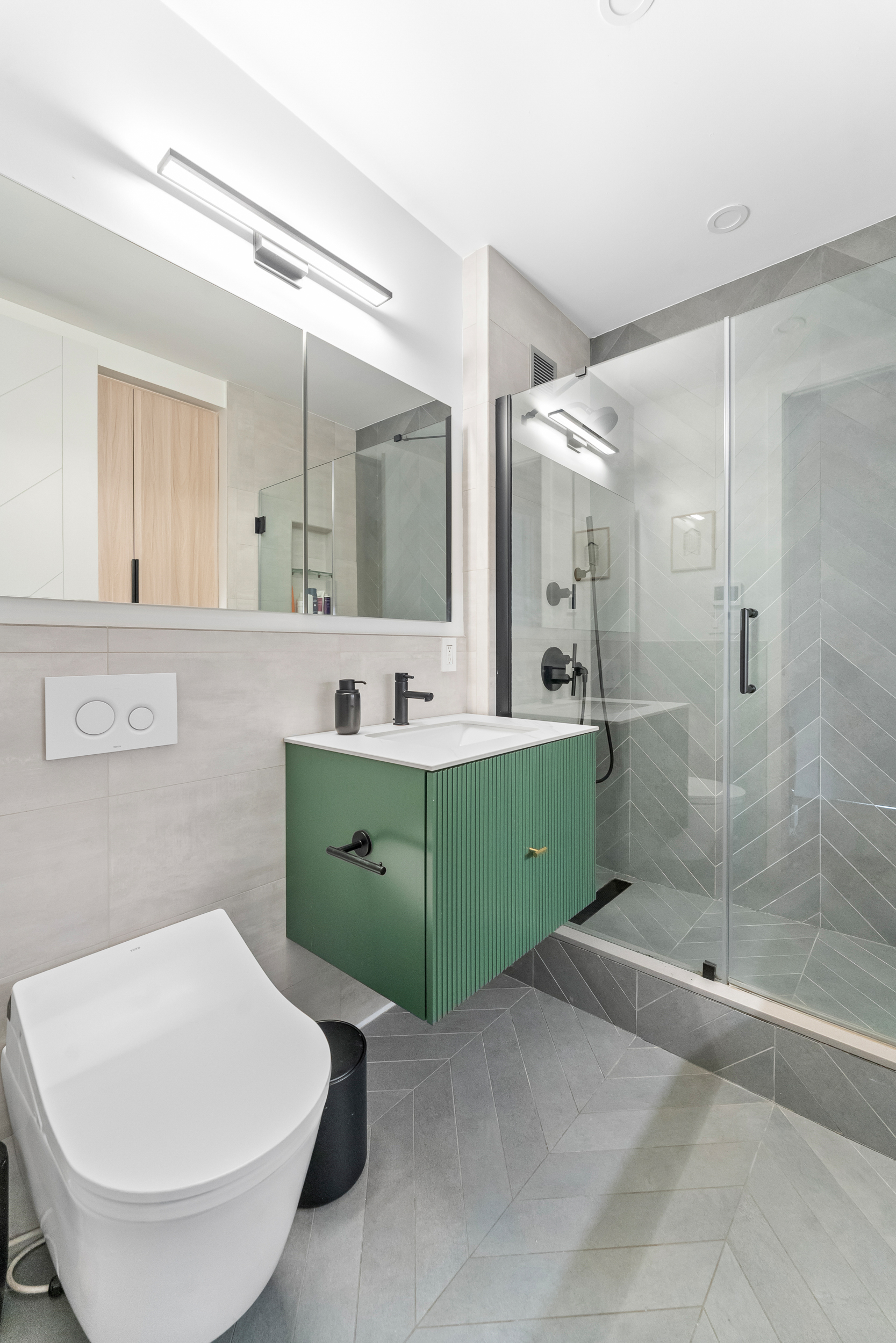 55 Poplar Street, Unit 6A Brooklyn, NY 11201 - Photo 8 of 13 a bathroom with a sink mirror and a bathtub