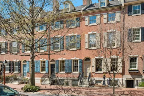 a front view of a building with street view