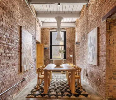 a kitchen with stainless steel appliances granite countertop a refrigerator and a stove