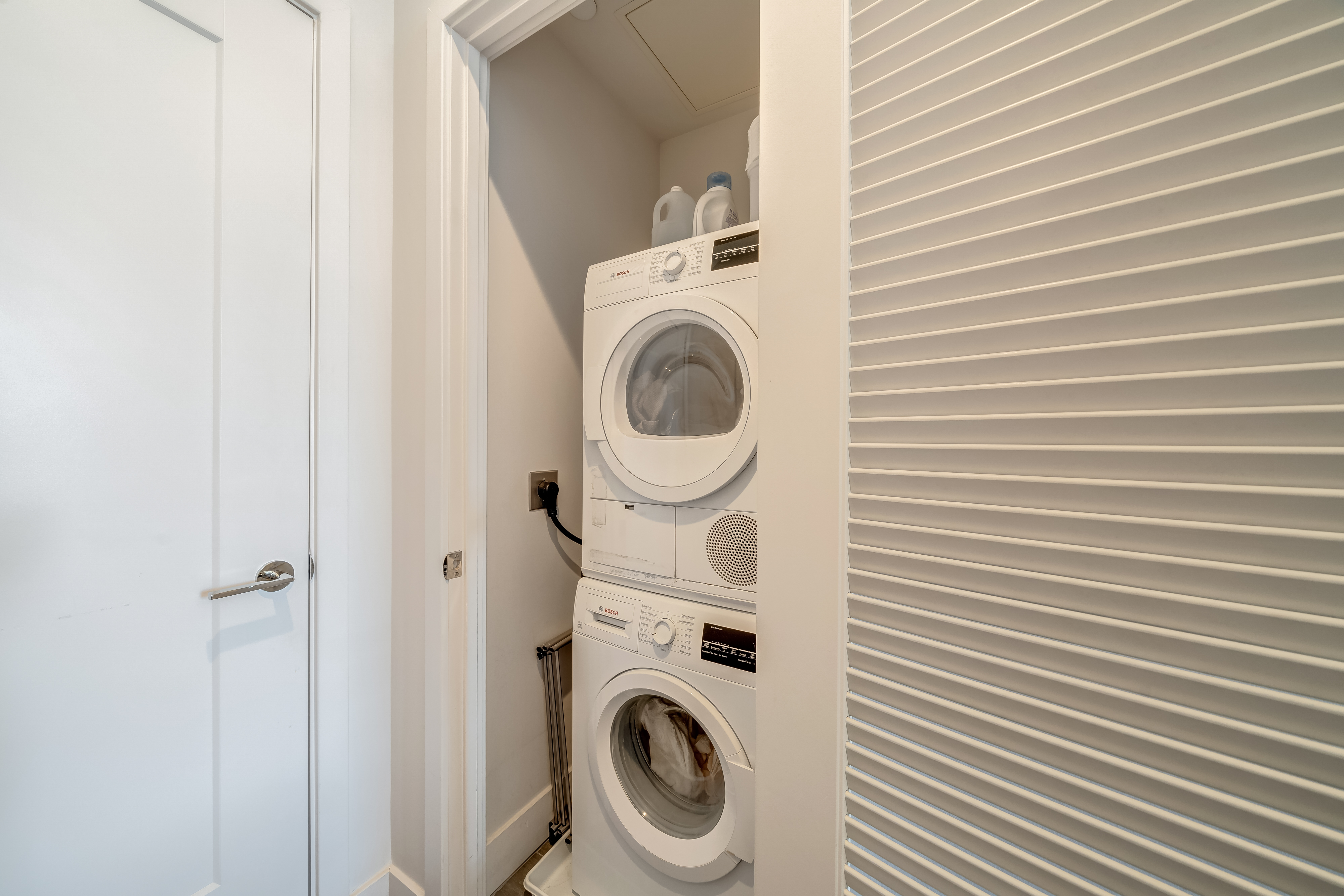 45 Sutton Square Southwest, Unit PH10 Washington, DC 20024 - Photo 31 of 44 a utility room with dryer and washer
