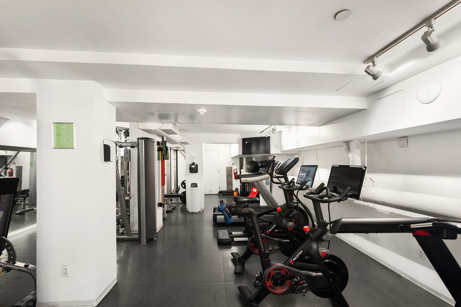 420 West 25th Street, Unit 2K Manhattan, NY 10001 - Photo 15 of 18 a view of a room with gym equipment