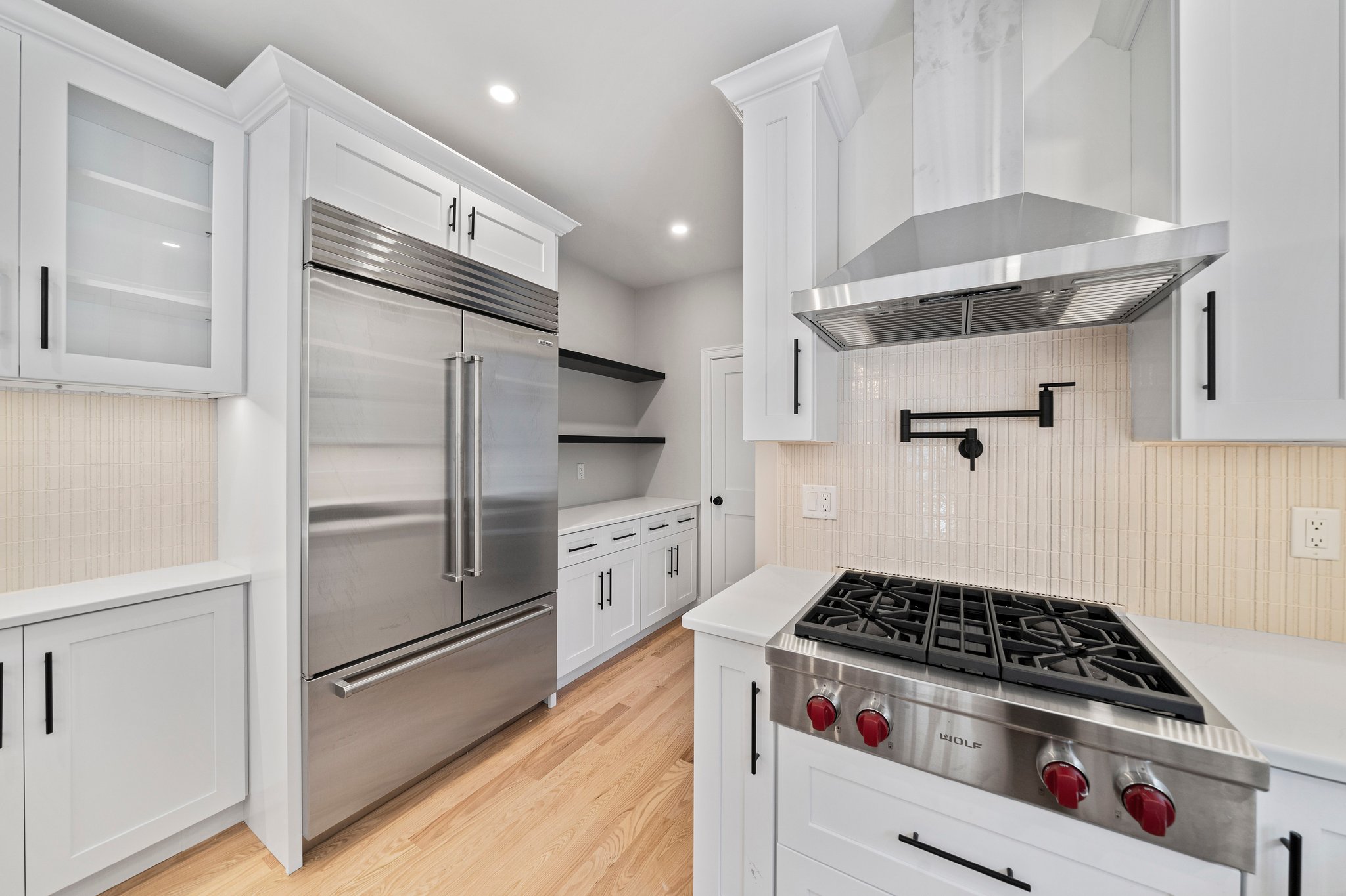 3 Everendon Road Canton, MA 02021 - Photo 7 of 35 a kitchen with cabinets and stainless steel appliances