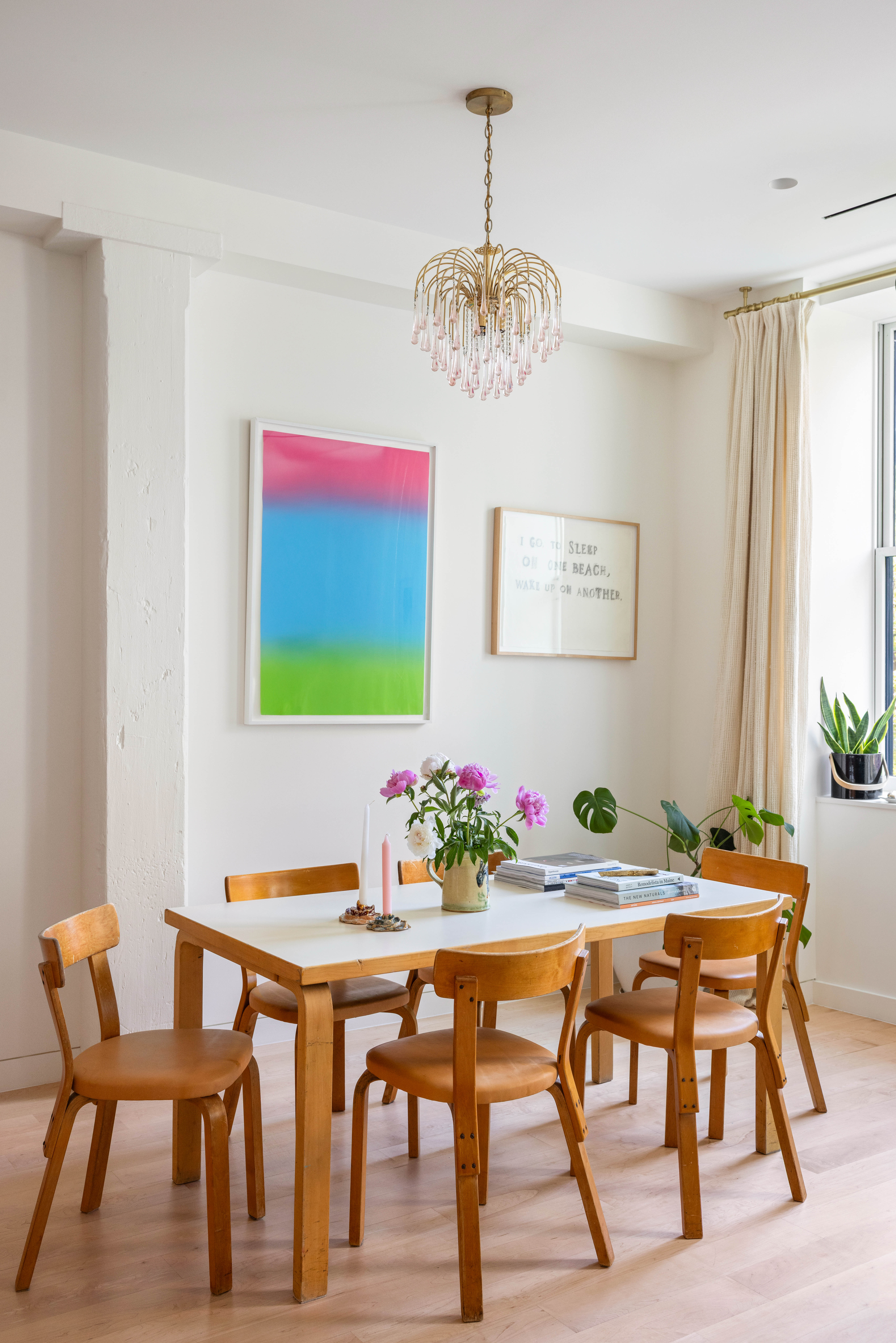 130 Jane Street, Unit 5/6F Manhattan, NY 10014 - Photo 8 of 23 a view of a dining room with furniture window and wooden floor