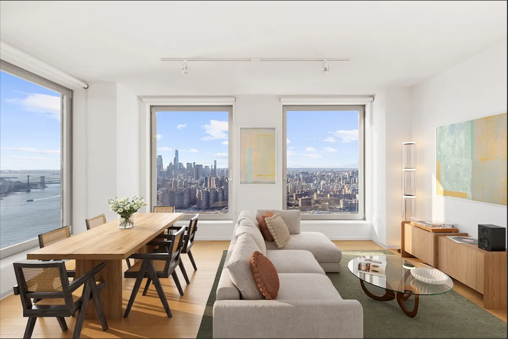 5 South 5th Street, Unit 5300 Brooklyn, NY 11249 - Photo 2 of 28 a living room with furniture and a large window