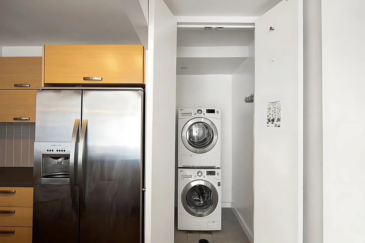 181 Clermont Avenue, Unit 101 Brooklyn, NY 11205 - Photo 4 of 9 a utility room with dryer and washer