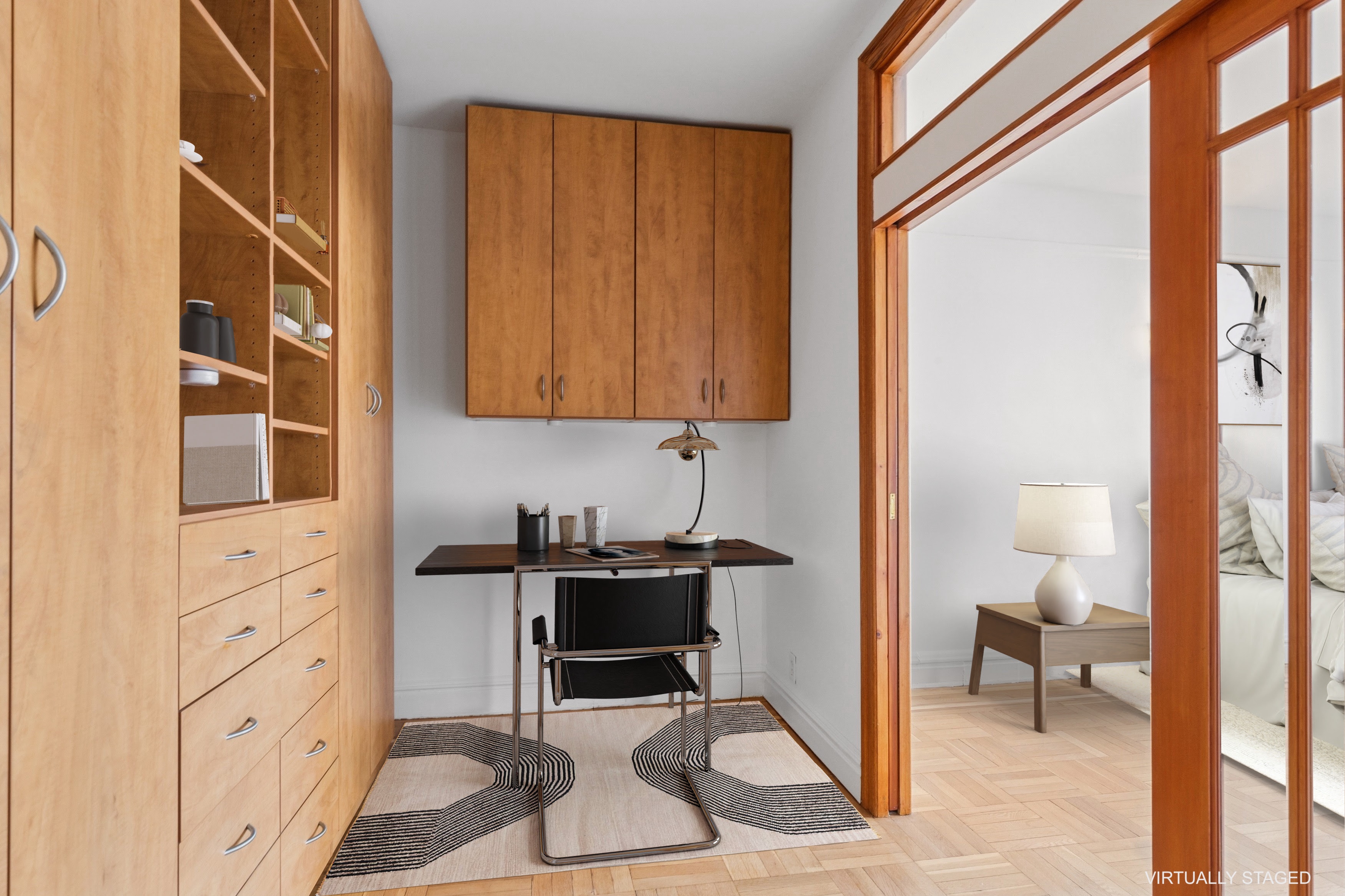 115 Cabrini Boulevard, Unit B51 Manhattan, NY 10033 - Photo 9 of 23 a view of a workspace with furniture and a window