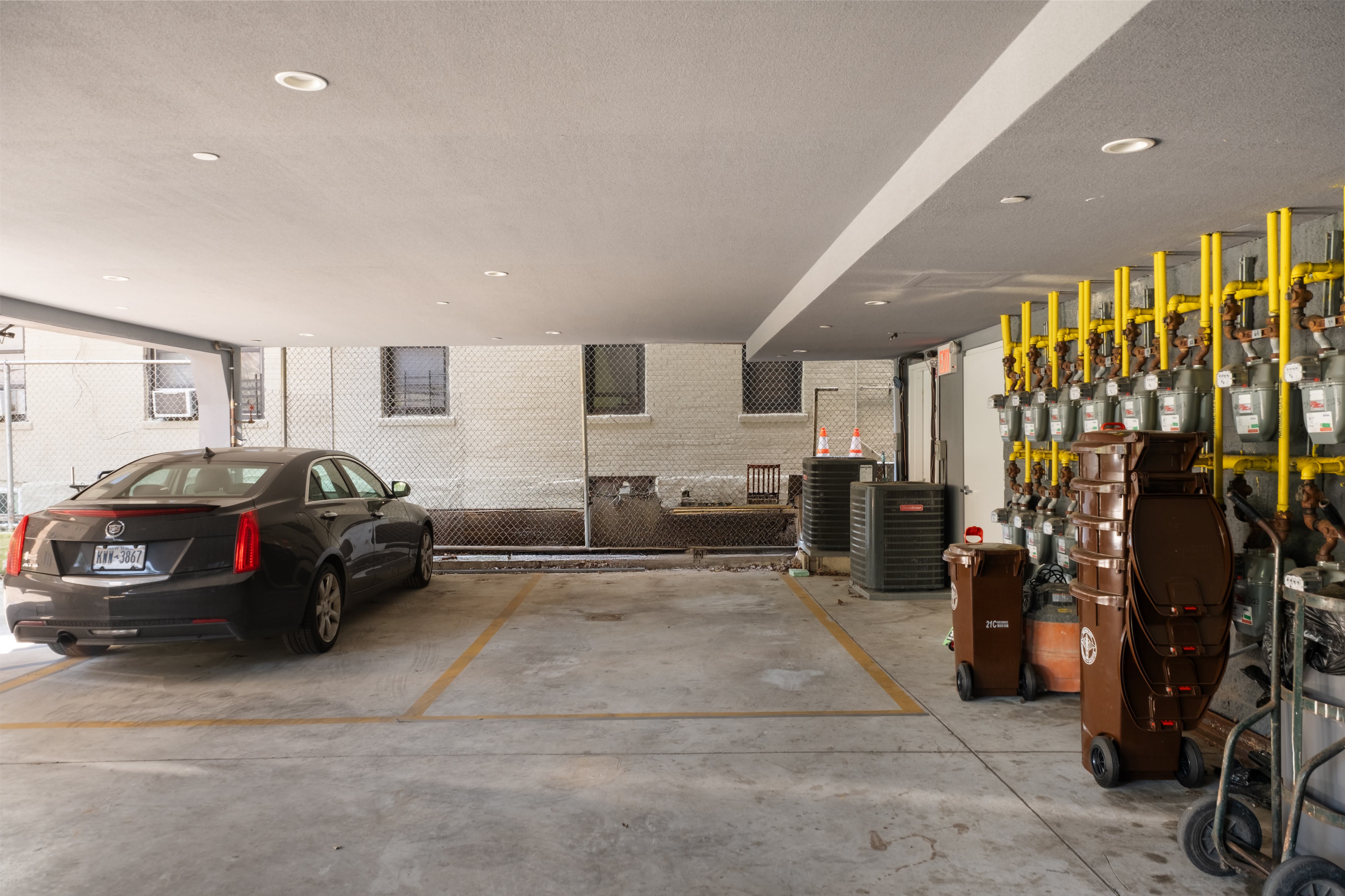 2025 Ocean Avenue, Unit 1B Brooklyn, NY 11230 - Photo 8 of 10 a car parked in a parking garage