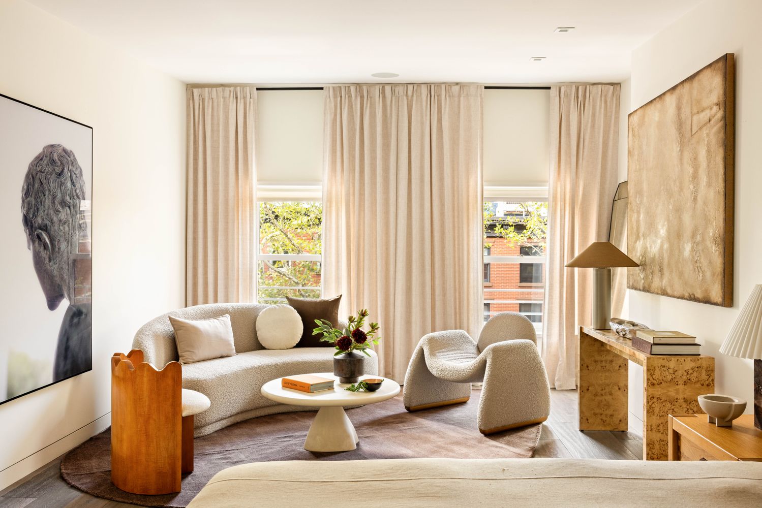 a bedroom with a bed and a lamp with window