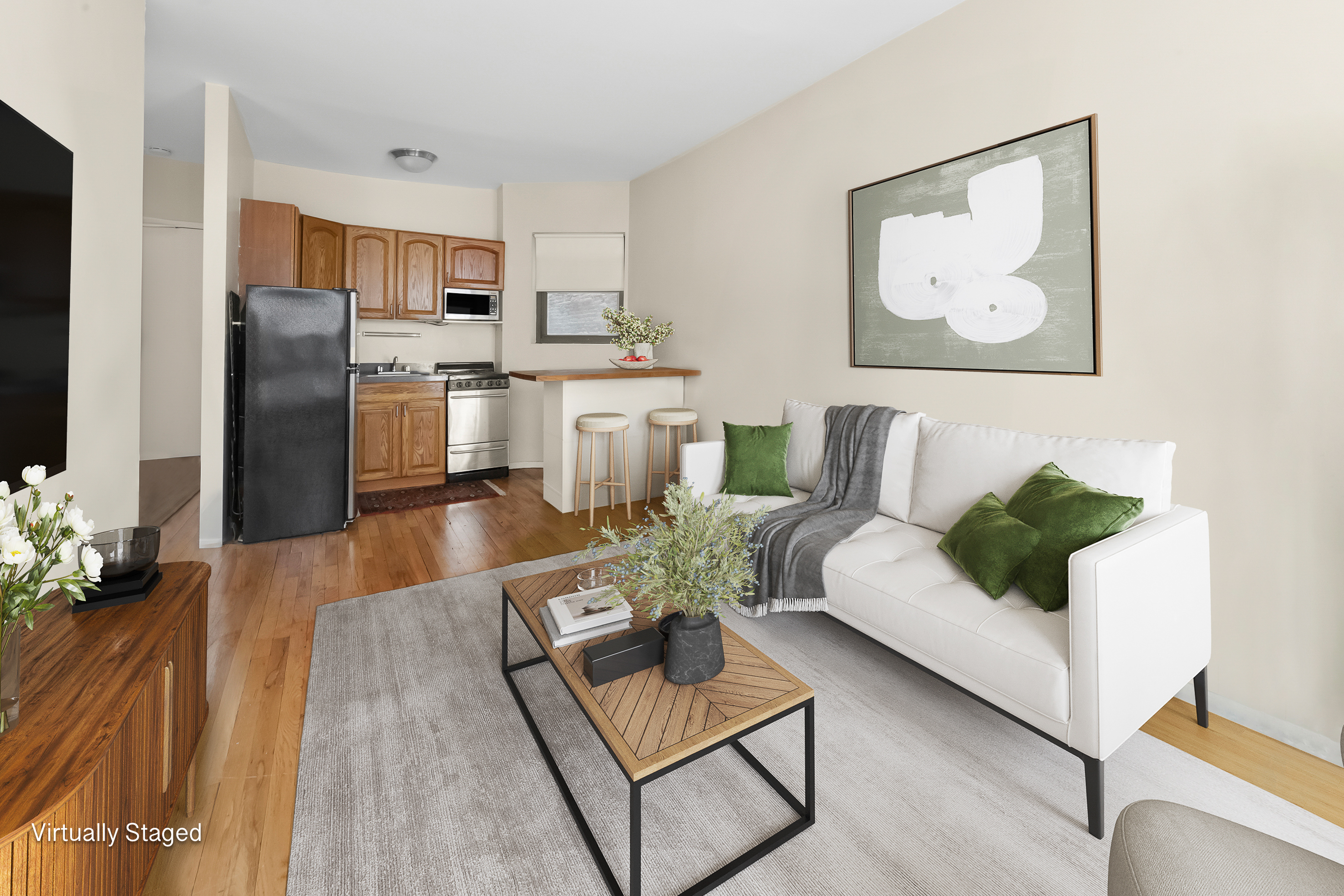 160 East 91st Street, Unit 4A Manhattan, NY 10128 - Photo 2 of 8 a living room with stainless steel appliances furniture and a view of kitchen