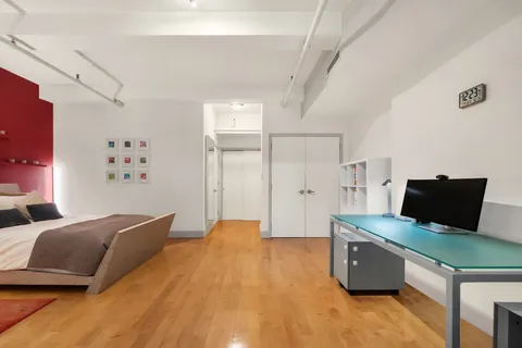 a bathroom with a bathtub and toilet