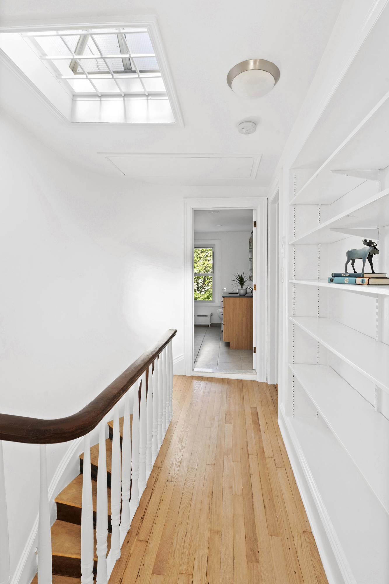 237 Bergen Street, Unit 2 Brooklyn, NY 11217 - Photo 4 of 11 a view of a hallway with wooden floor and cabinet