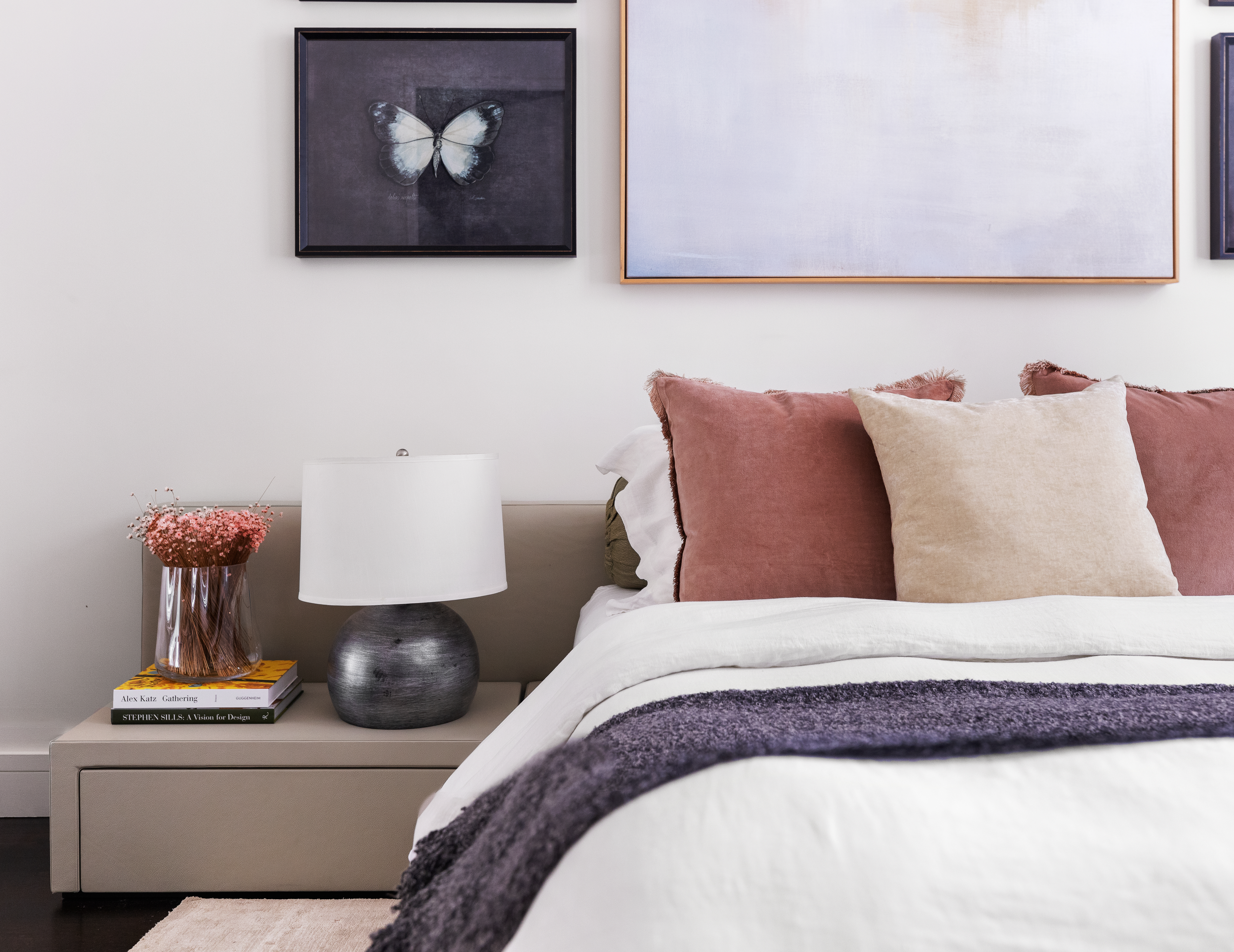 388 West Broadway, Unit 2 Manhattan, NY 10012 - Photo 21 of 27 a bedroom with a bed and painting on the wall