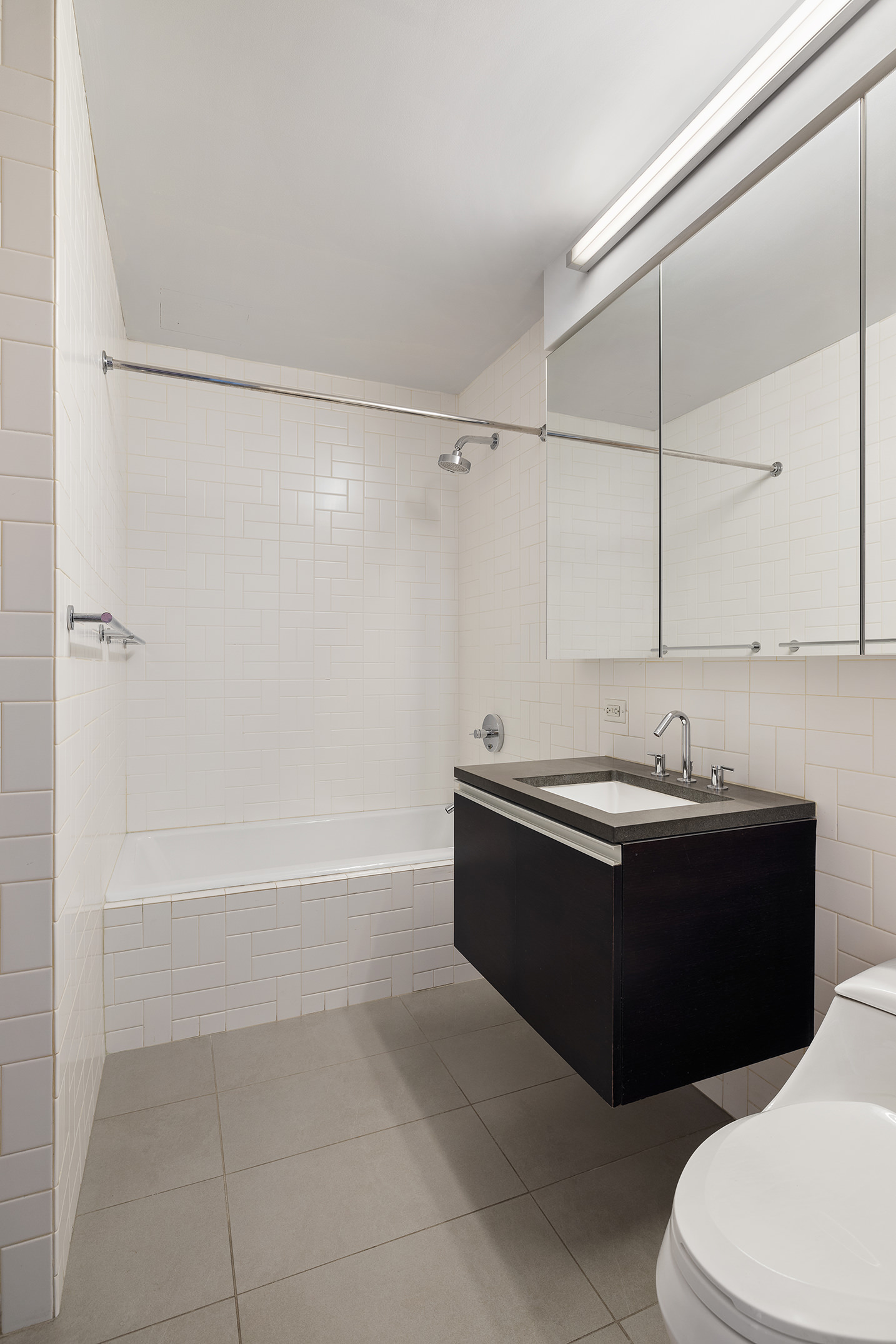 110 3rd Avenue, Unit 4C Manhattan, NY 10003 - Photo 10 of 17 a bathroom with a bathtub and shower
