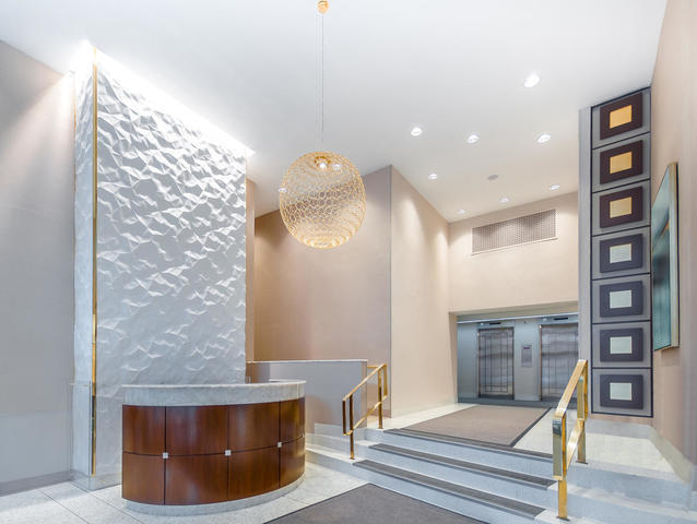 66-36 Yellowstone Boulevard, Unit 24A Queens, NY 11375 - Photo 13 of 20 a view of living room with furniture and lamp