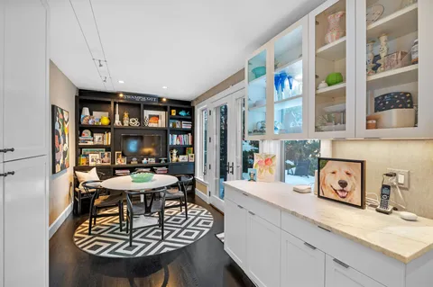 a view of a livingroom with furniture and window