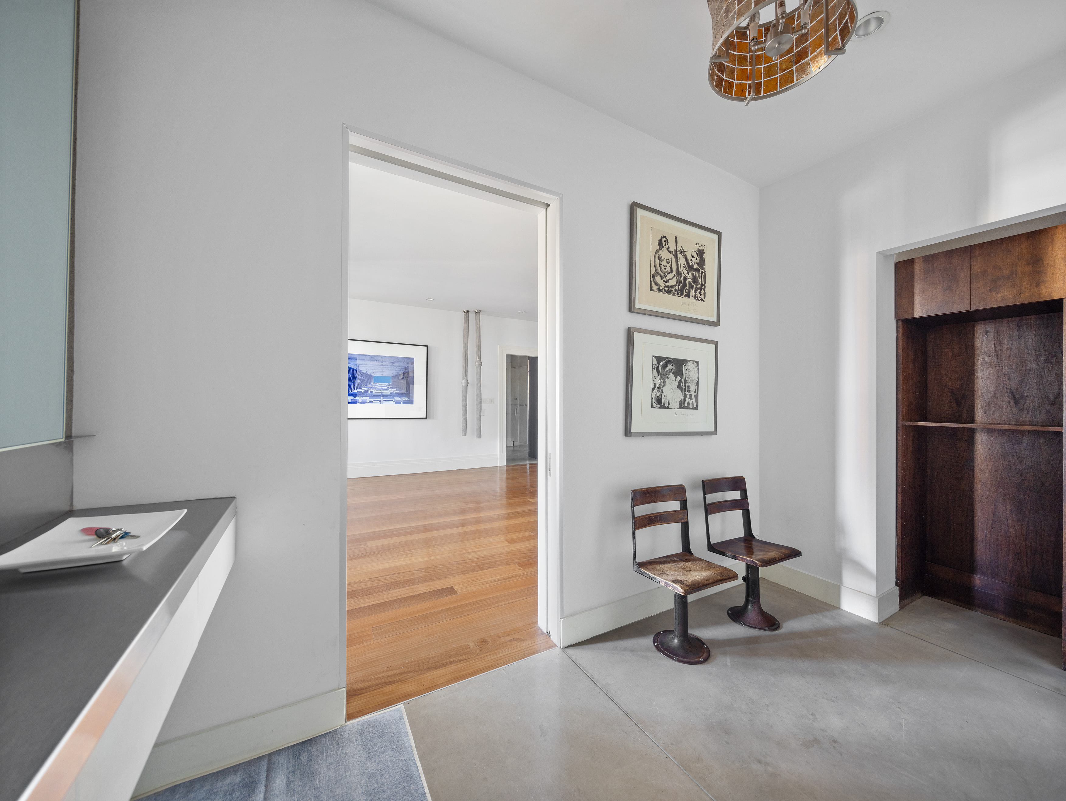 27 North Moore Street, Unit 10D Manhattan, NY 10013 - Photo 7 of 30 a view of a workspace with furniture