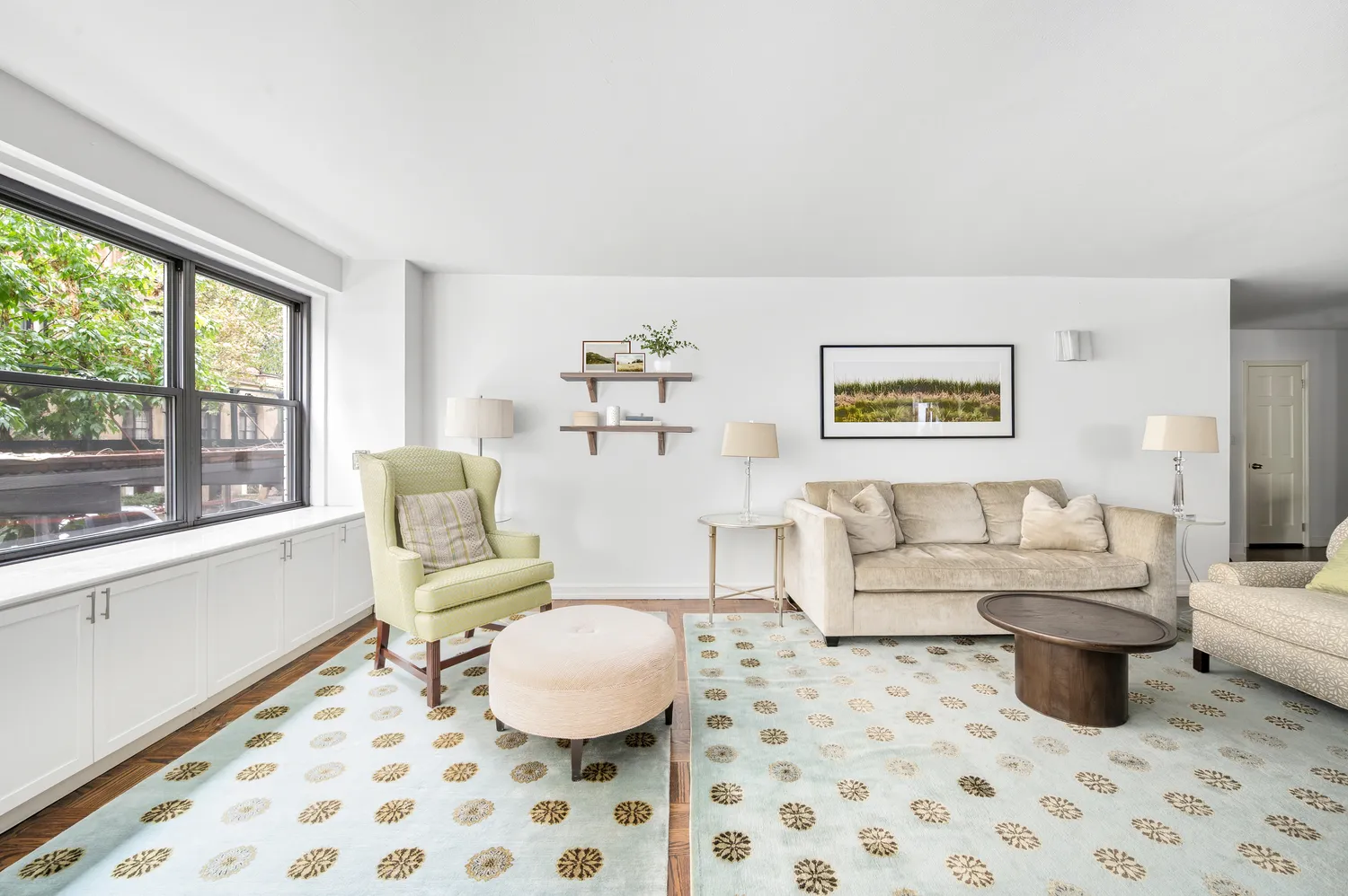 a living room with furniture and a window