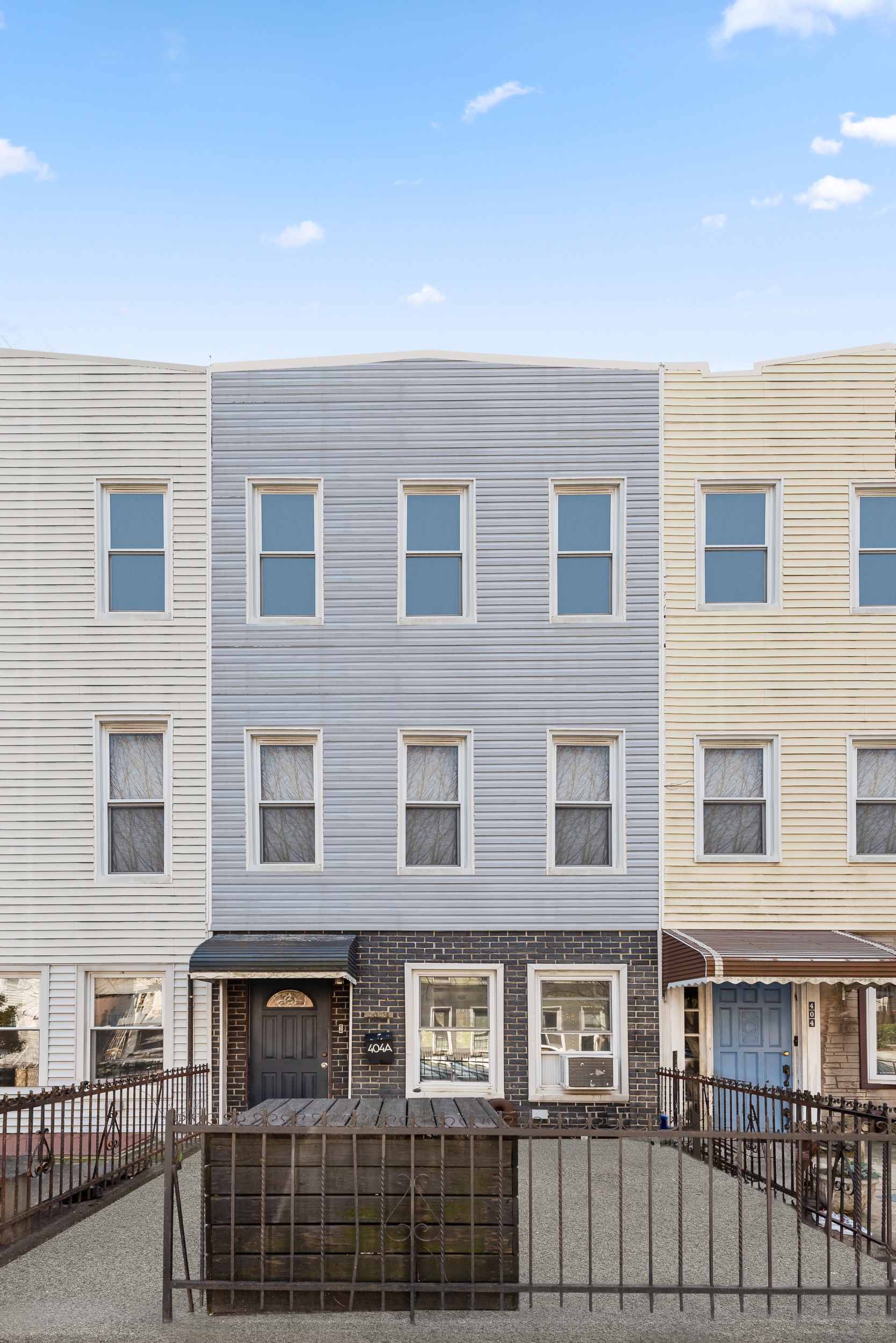 404 A 17th Street, Unit 3 Brooklyn, NY 11215 - Photo 9 of 9 a front view of a building with glass windows