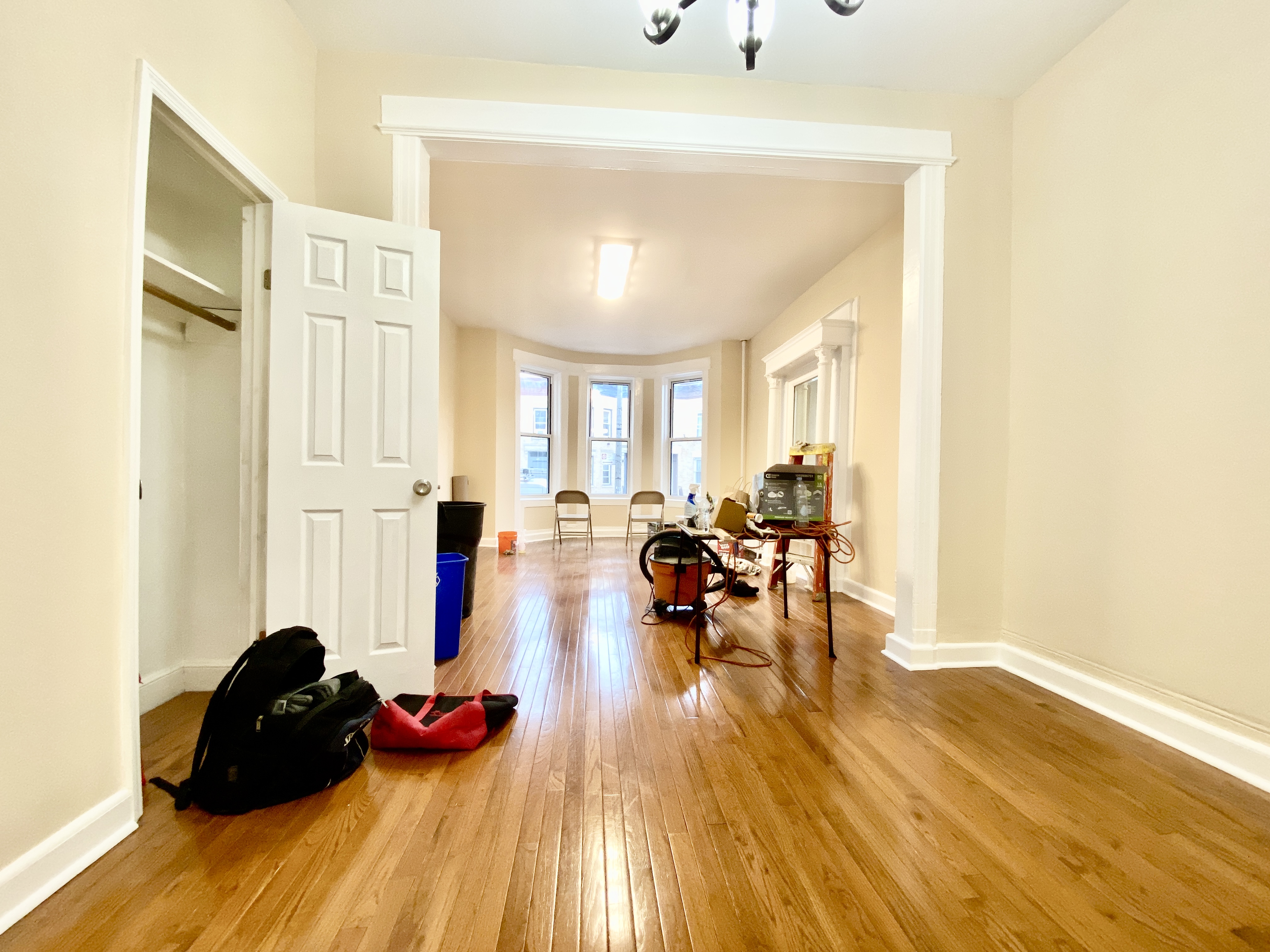 1308 Park Place, Unit 1 Brooklyn, NY 11213 - Photo 2 of 9 a living room with furniture and wooden floor