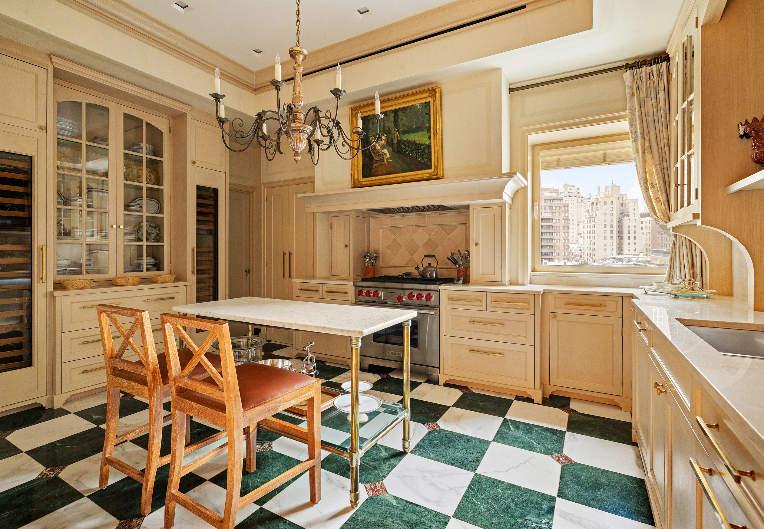 778 Park Avenue, Unit 8 Manhattan, NY 10021 - Photo 9 of 20 a kitchen with a stove a sink and a refrigerator
