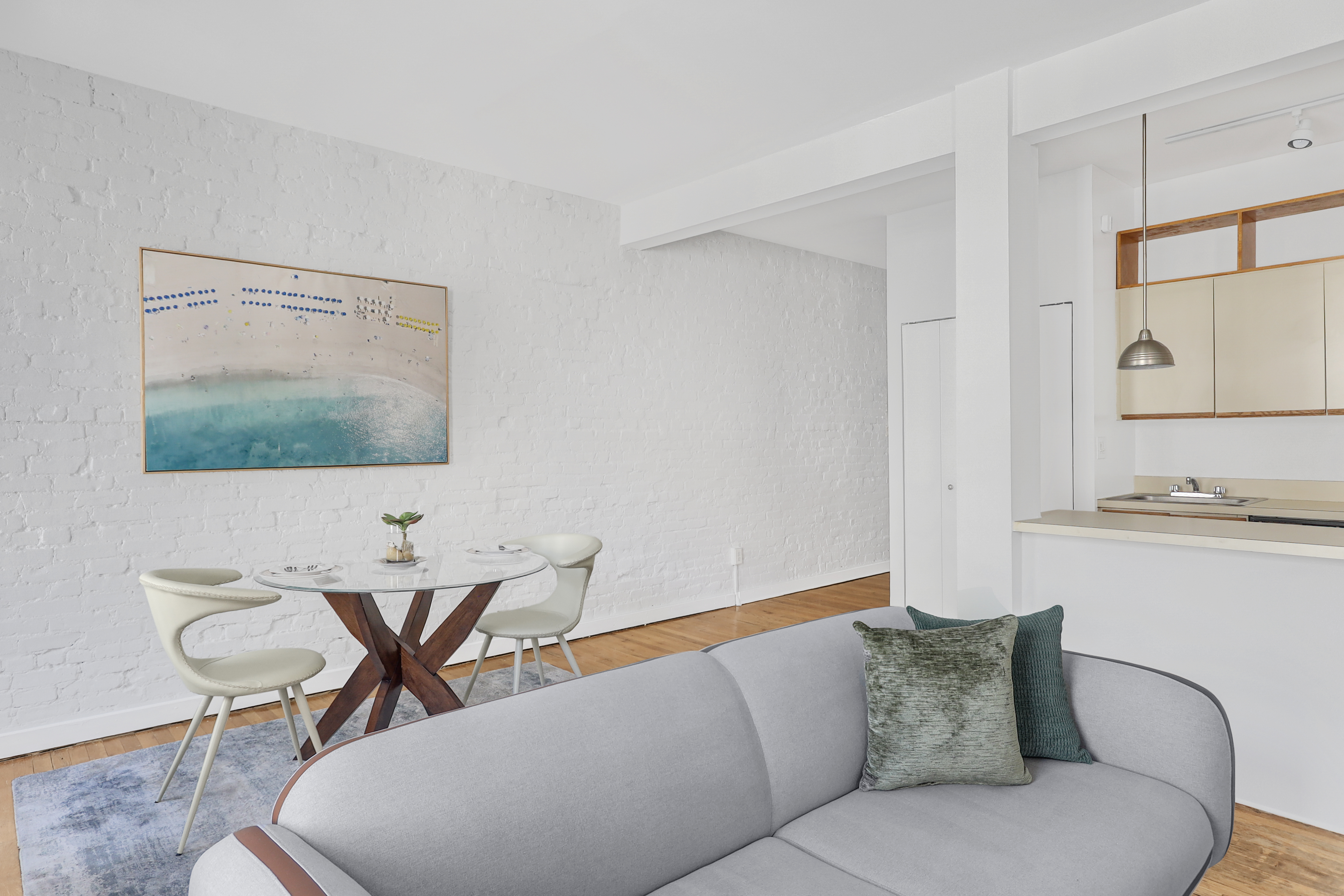 314 West 94th Street, Unit 5D Manhattan, NY 10025 - Photo 2 of 13 a living room with furniture and a flat screen tv