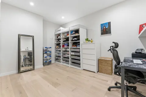 a view of a workspace with furniture