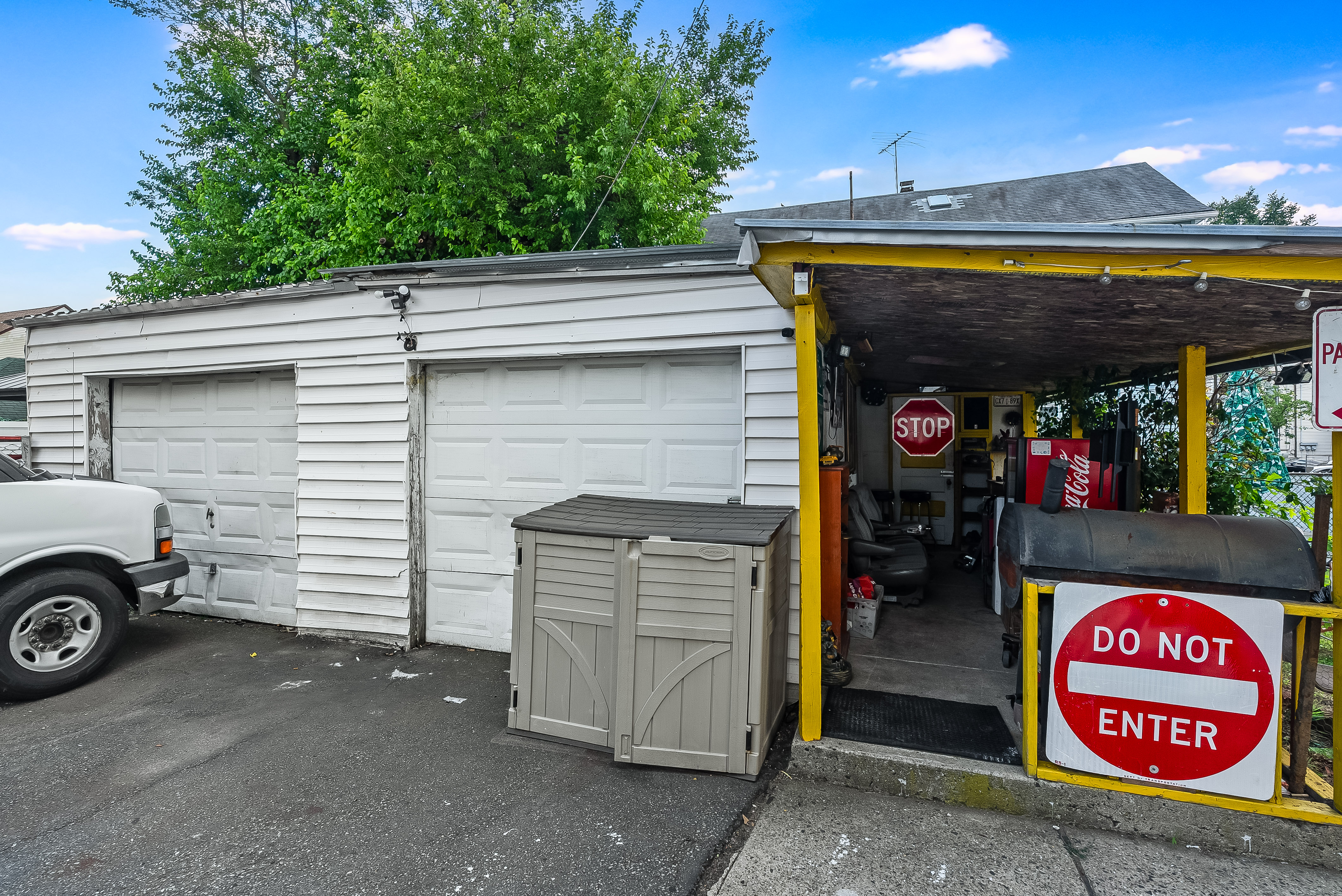 102-104 22nd Avenue Paterson, NJ 07513 - Photo 31 of 37 a view of a car garage and a chair