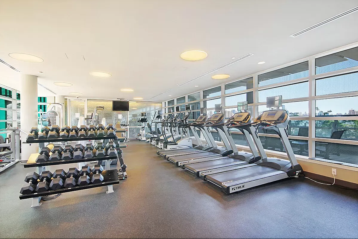 1 Northside Piers, Unit 18C Brooklyn, NY 11249 - Photo 7 of 12 a view of a room with gym equipment