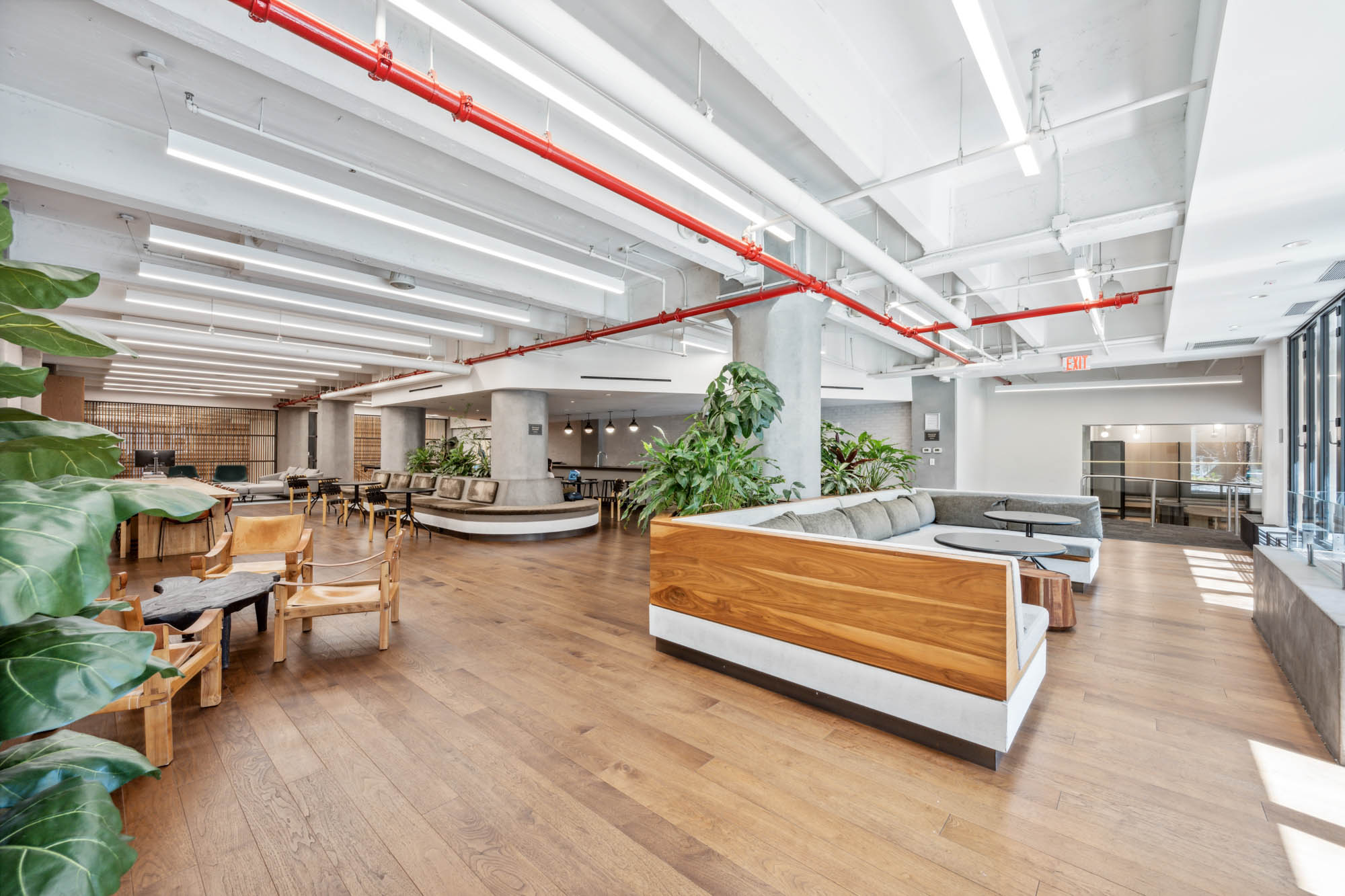 184 Kent Avenue, Unit D512 Brooklyn, NY 11249 - Photo 8 of 11 a view of a dining room with wooden floor and furniture
