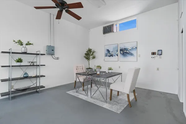 a view of a kitchen from the hallway