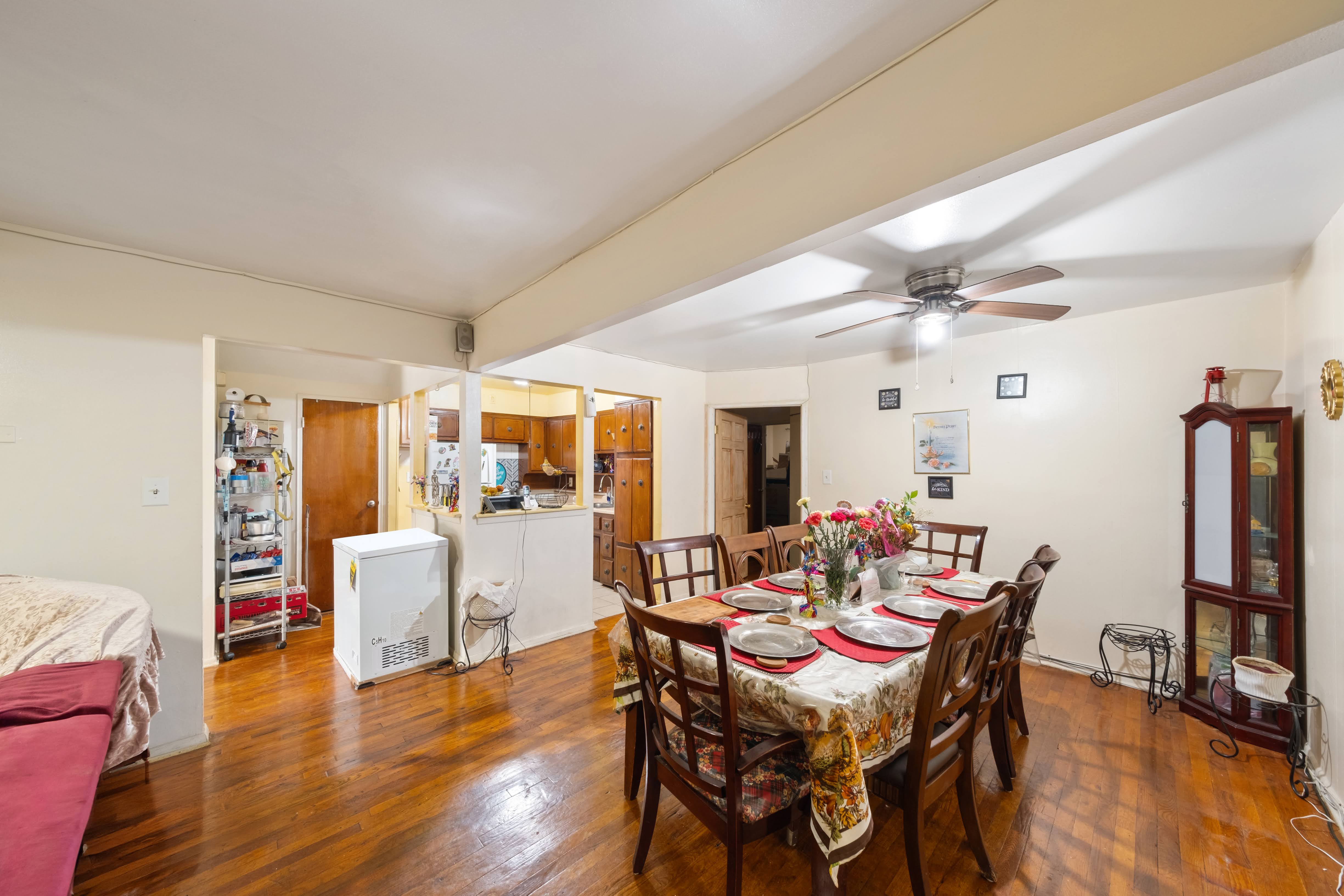 1464 East 84th Street Brooklyn, NY 11236 - Photo 3 of 22 a view of a dining room with furniture window and wooden floor