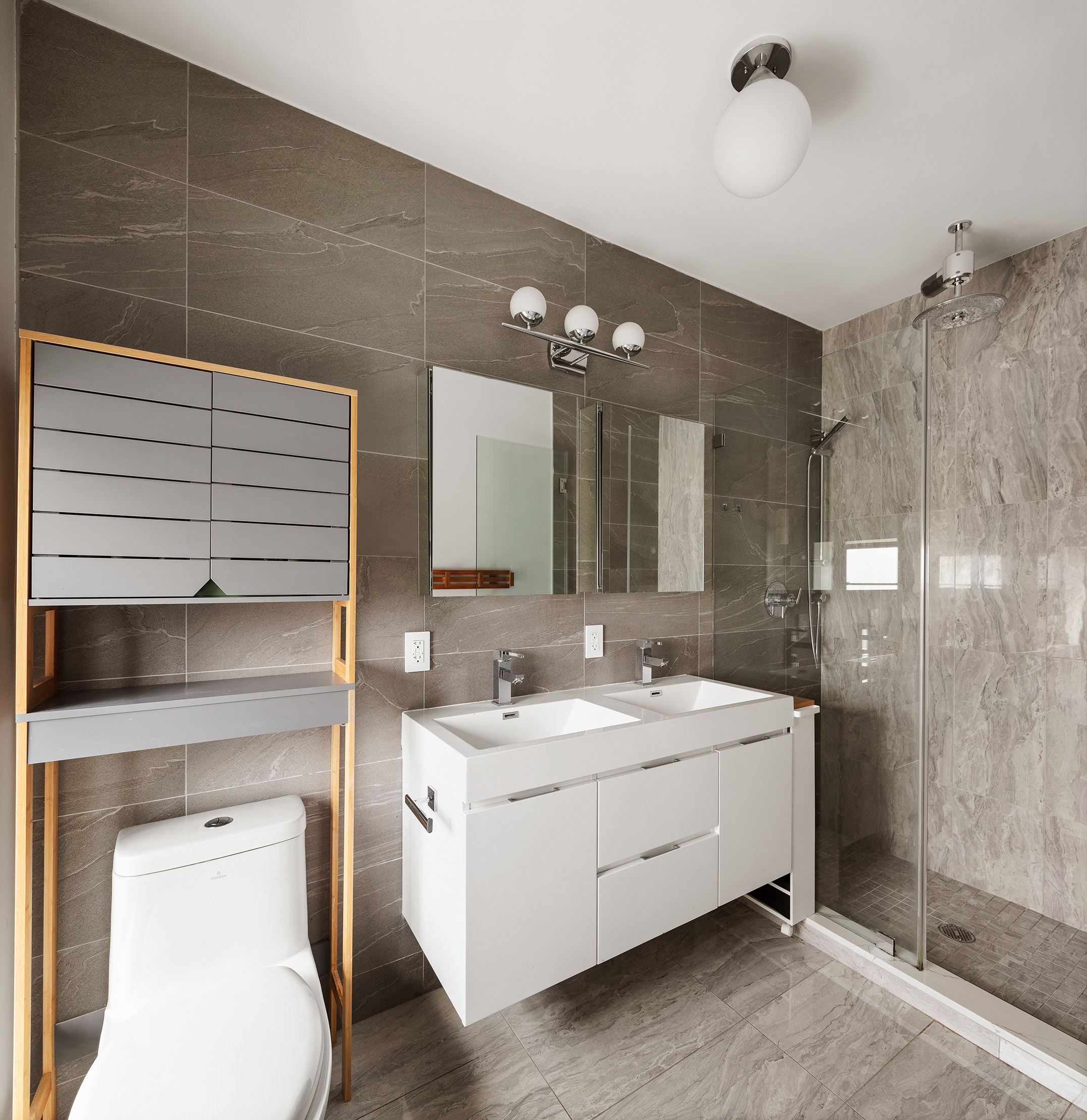 351 Union Street, Unit B Brooklyn, NY 11231 - Photo 9 of 14 a bathroom with a double vanity sink toilet and shower