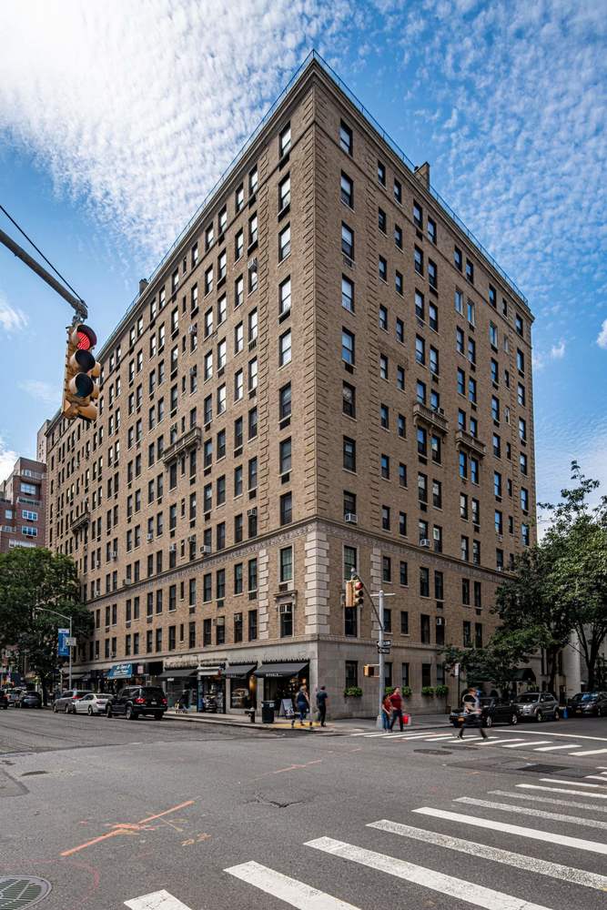 136 East 64th Street, Unit 11E Manhattan, NY 10065 - Photo 13 of 14 a view of a building and a street