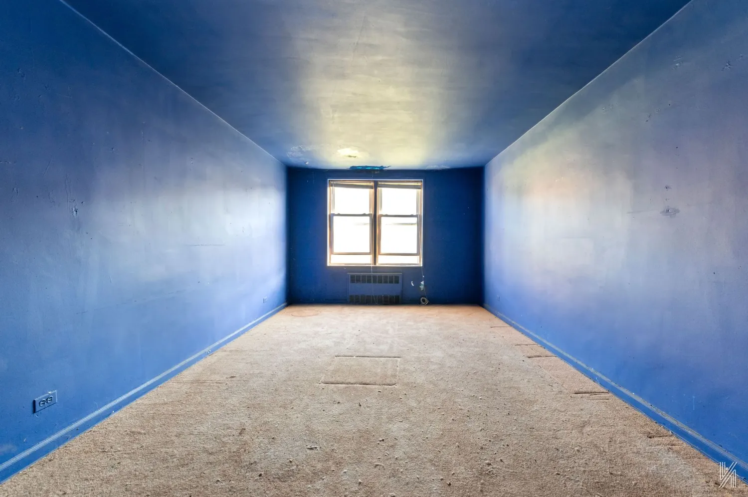 an empty room with windows