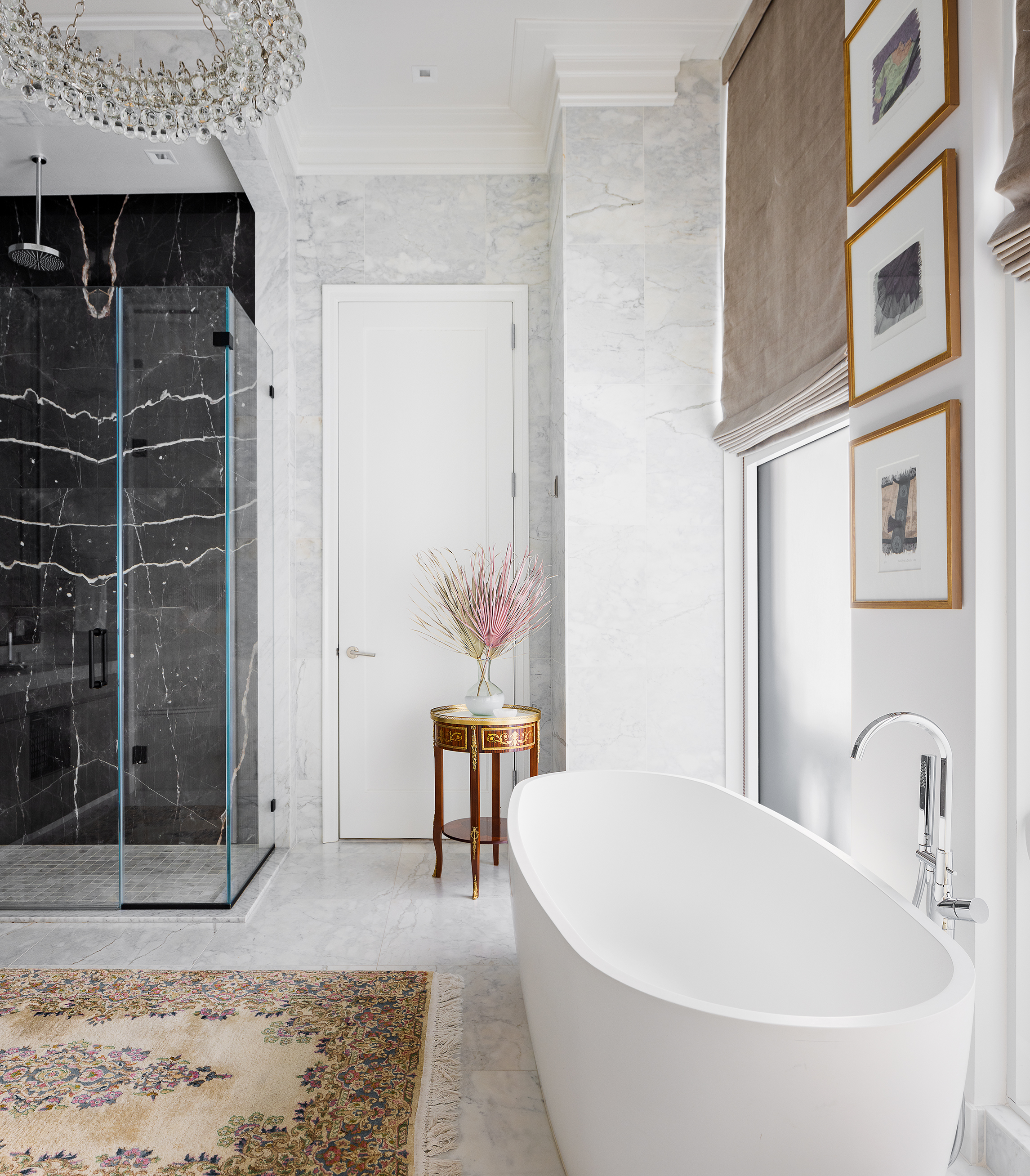 108 Leonard Street, Unit 2A Manhattan, NY 10013 - Photo 5 of 7 a white bath tub sitting next to a bathroom sink