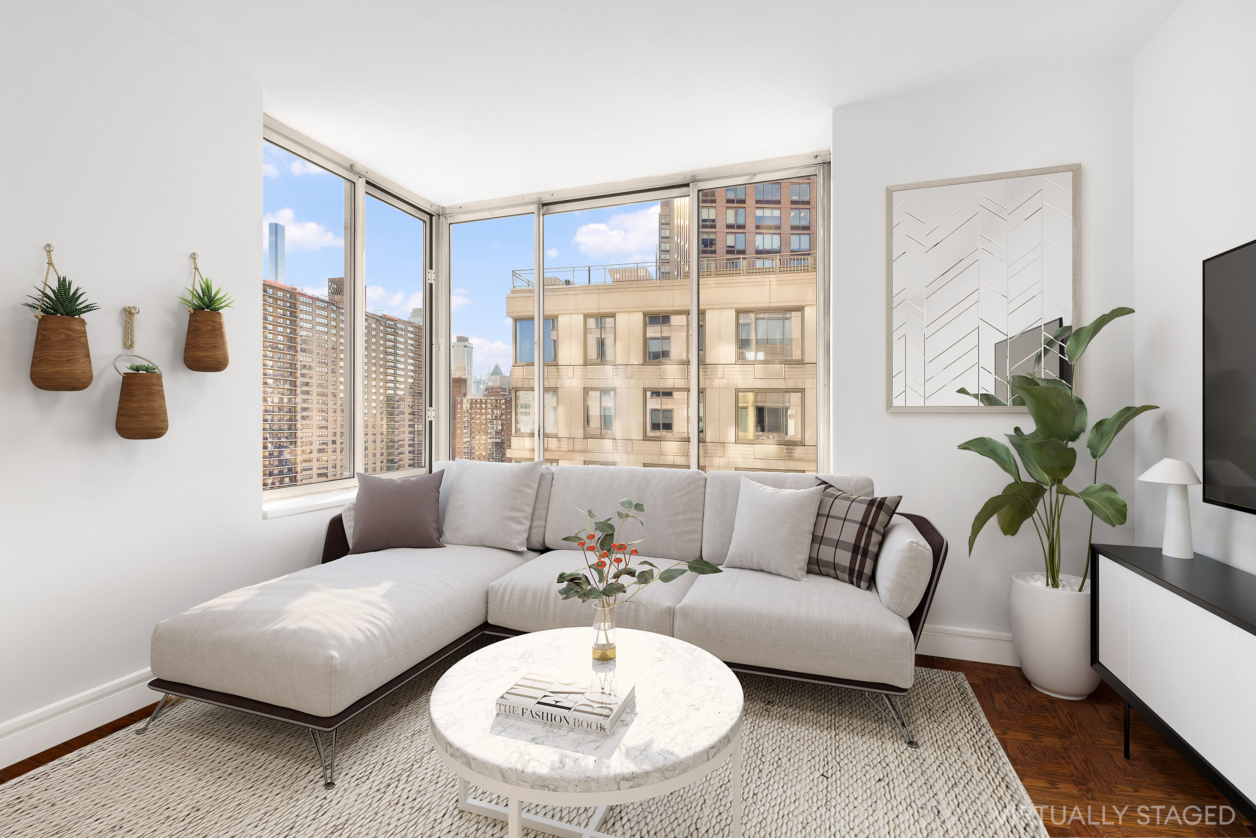 200 Riverside Boulevard, Unit 15F Manhattan, NY 10069 - Photo 3 of 11 a living room with furniture and a large window