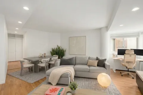 a living room with furniture and a couch