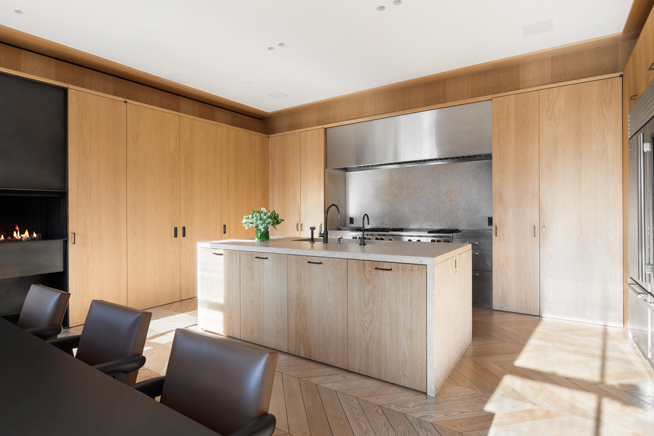 54 Bond Street, Unit PH Manhattan, NY 10012 - Photo 10 of 31 a living room with furniture and a flat screen tv