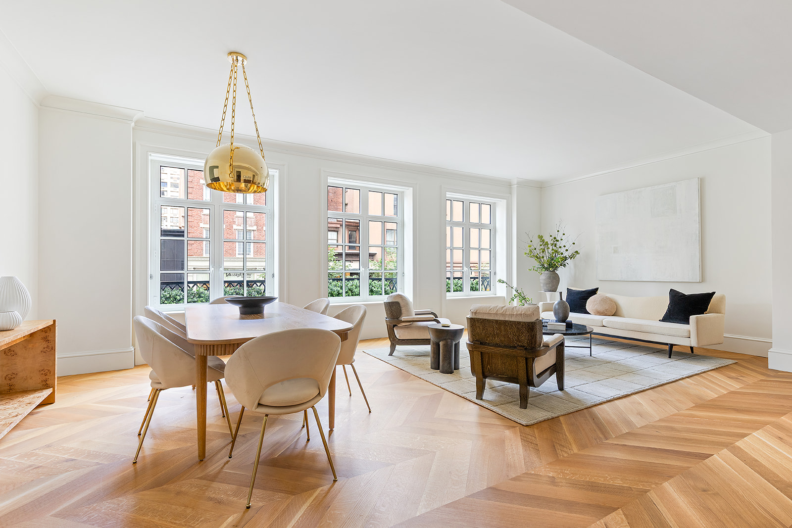 1045 Madison Avenue, Unit 3B Manhattan, NY 10075 - Photo 3 of 14 a living room with furniture a window and a table