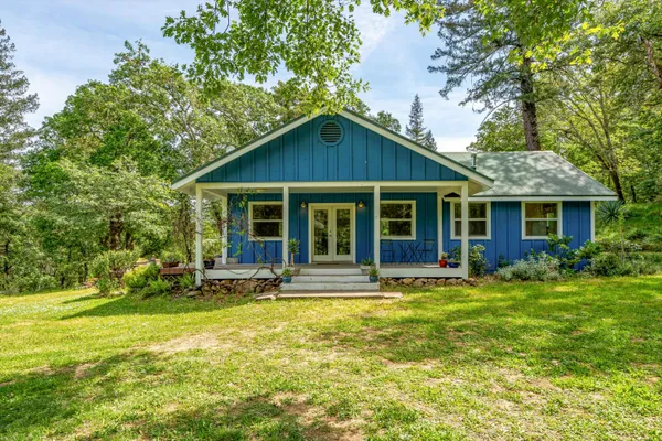 a house view with a garden space