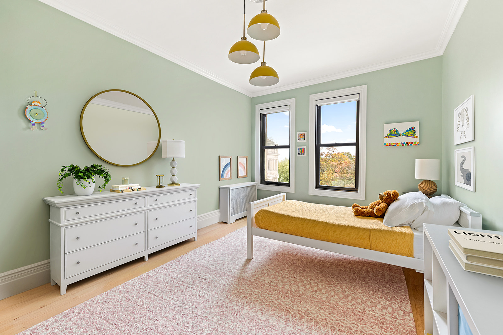 125 Eastern Parkway, Unit 6CK Brooklyn, NY 11238 - Photo 5 of 16 a bedroom with a bed and a chandelier