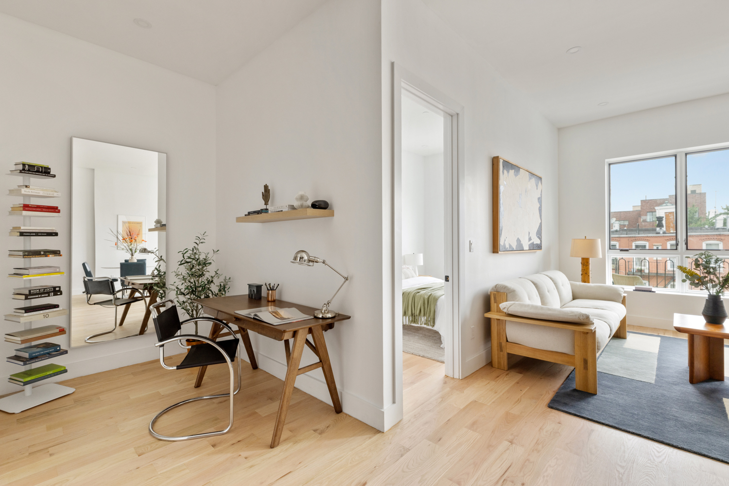 185 Withers Street, Unit 4 Brooklyn, NY 11211 - Photo 3 of 12 a living room with furniture and a large window