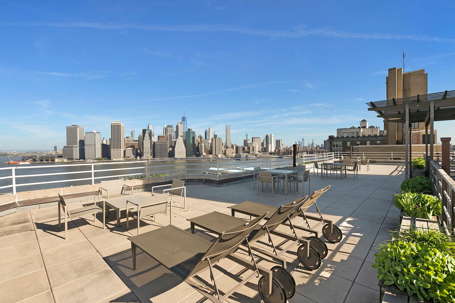 57 Montague Street, Unit 1D Brooklyn, NY 11201 - Photo 15 of 27 a view of a city with lawn chairs