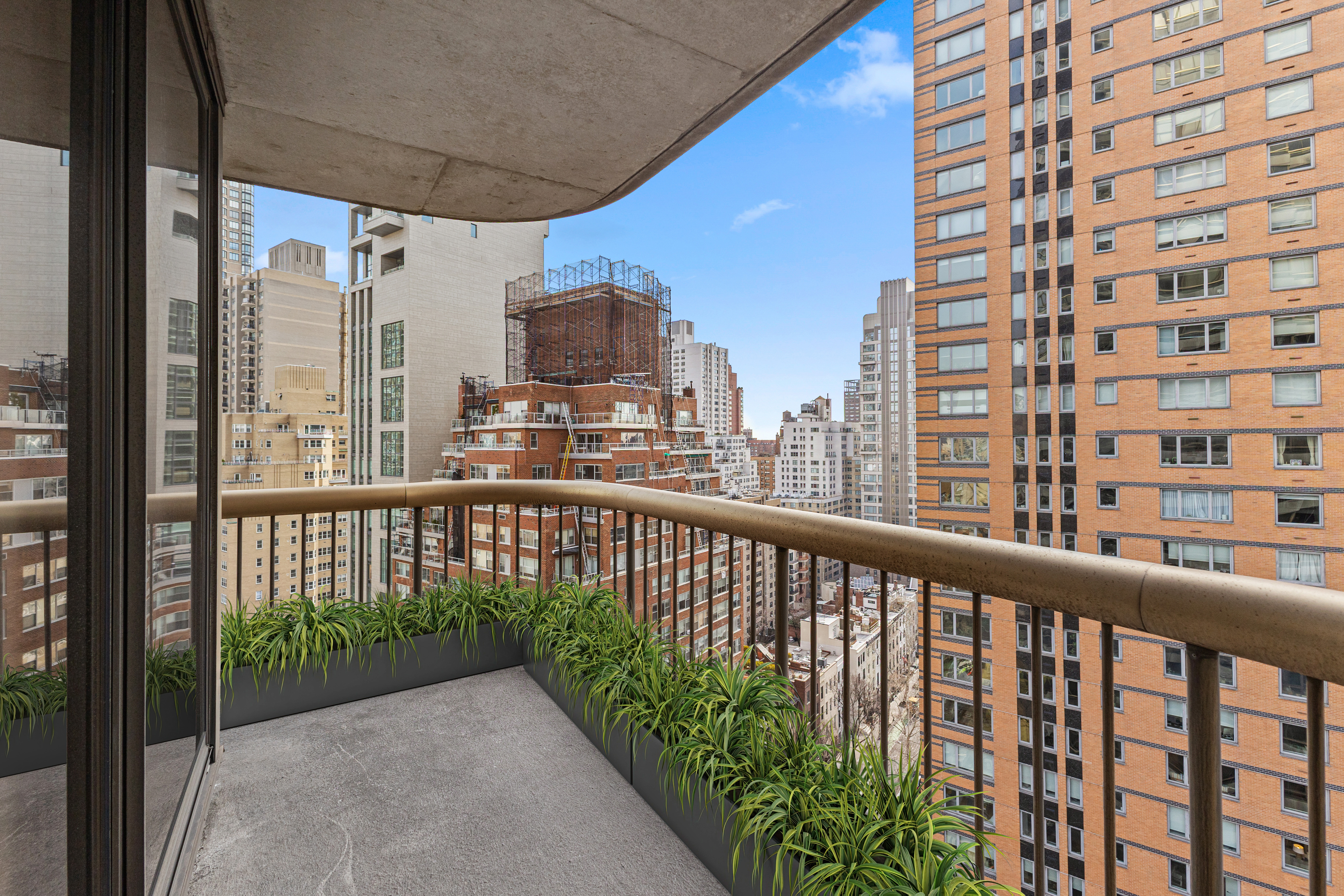 167 East 61st Street, Unit 20E Manhattan, NY 10065 - Photo 3 of 24 a city view from balcony